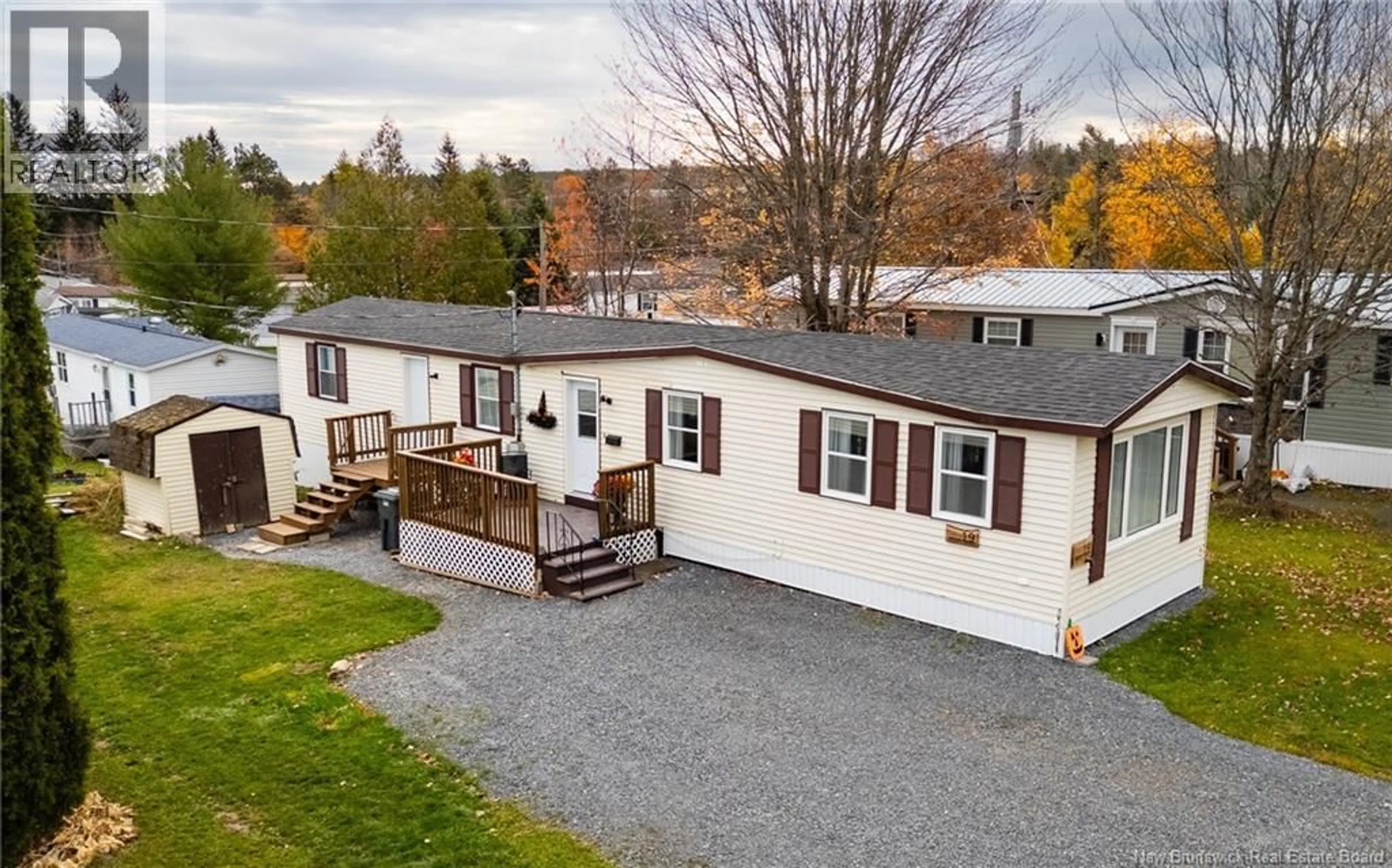 A pic from outside/outdoor area/front of a property/back of a property/a pic from drone, unknown for 19 KELLYS DRIVE, Fredericton New Brunswick E3B7R1