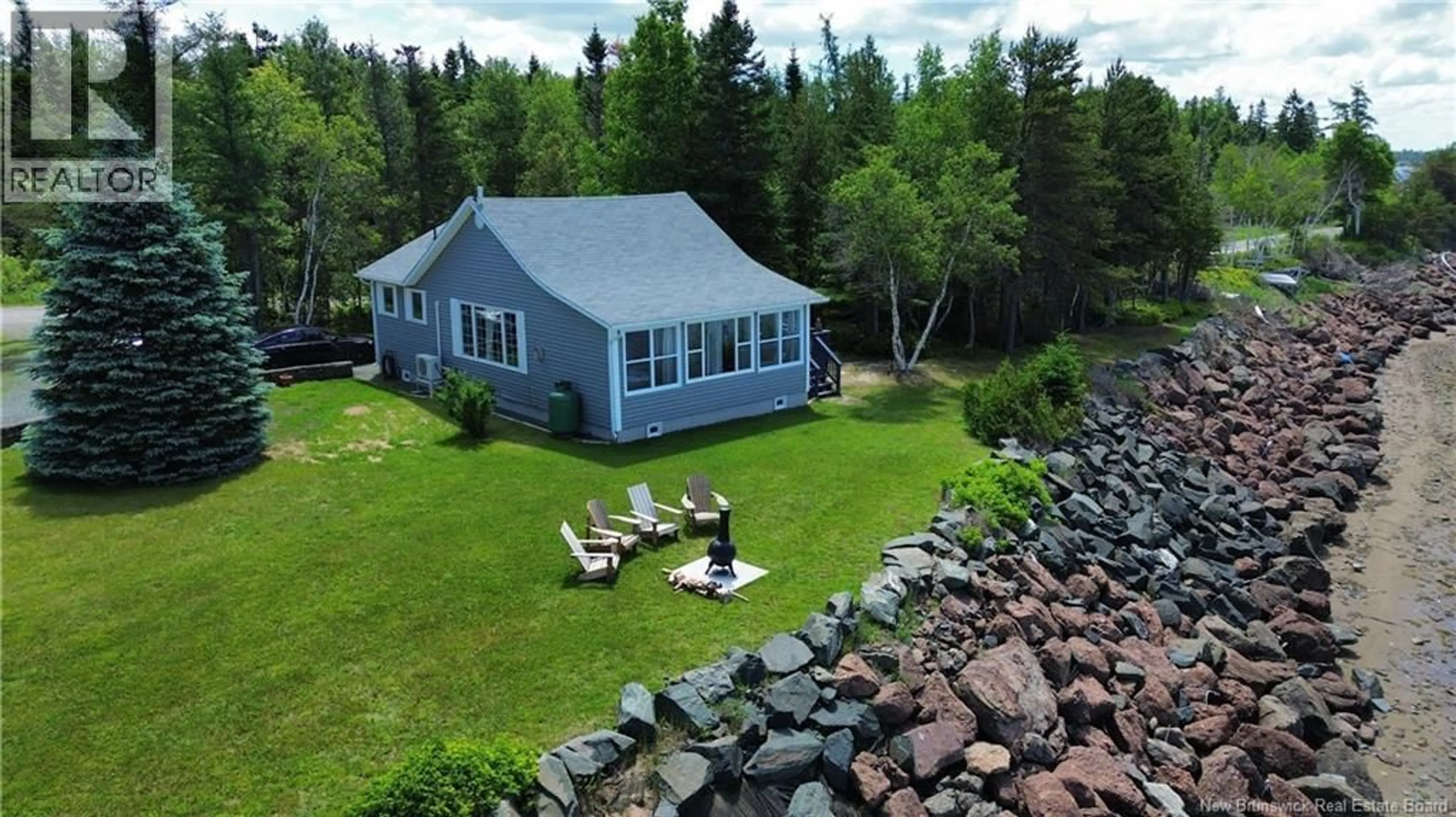 A pic from outside/outdoor area/front of a property/back of a property/a pic from drone, water/lake/river/ocean view for 40 FRONT STREET, Bay Du Vin New Brunswick E1N5K1