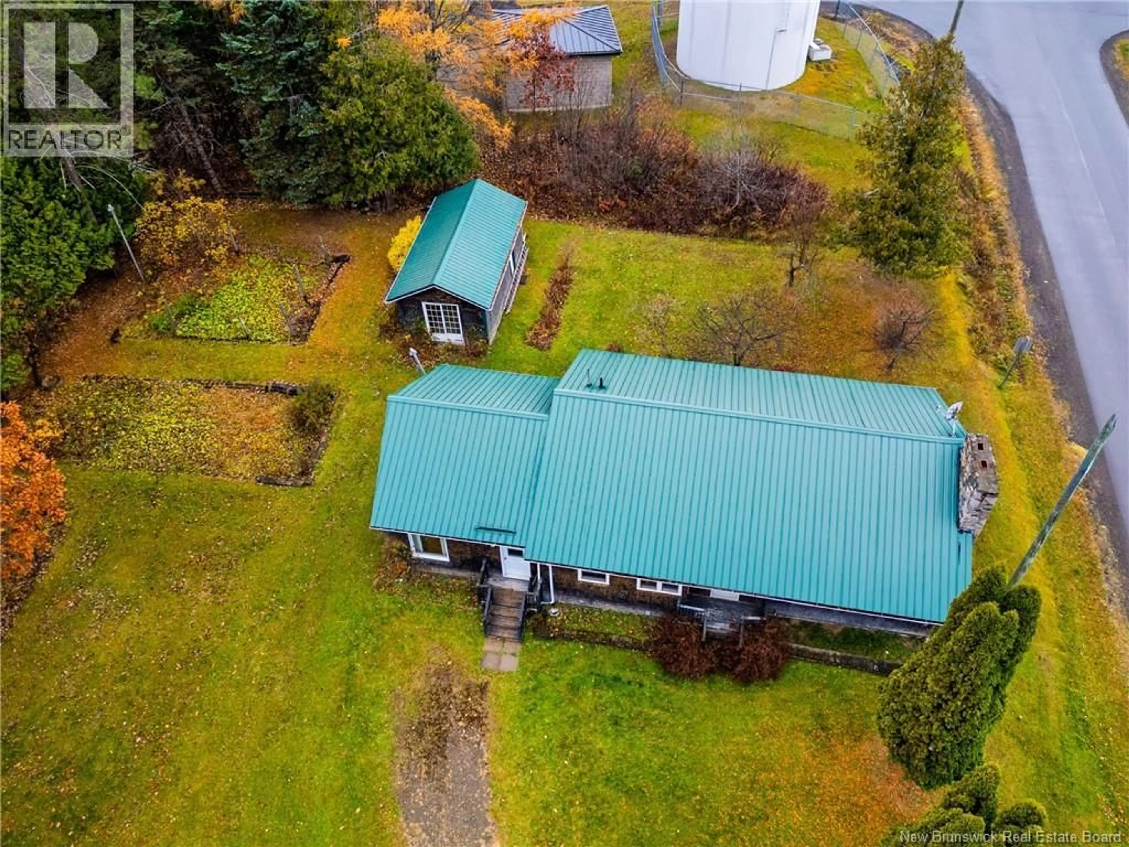 A pic from outside/outdoor area/front of a property/back of a property/a pic from drone, unknown for 87 FRASER STREET, Plaster Rock New Brunswick E7G1R9