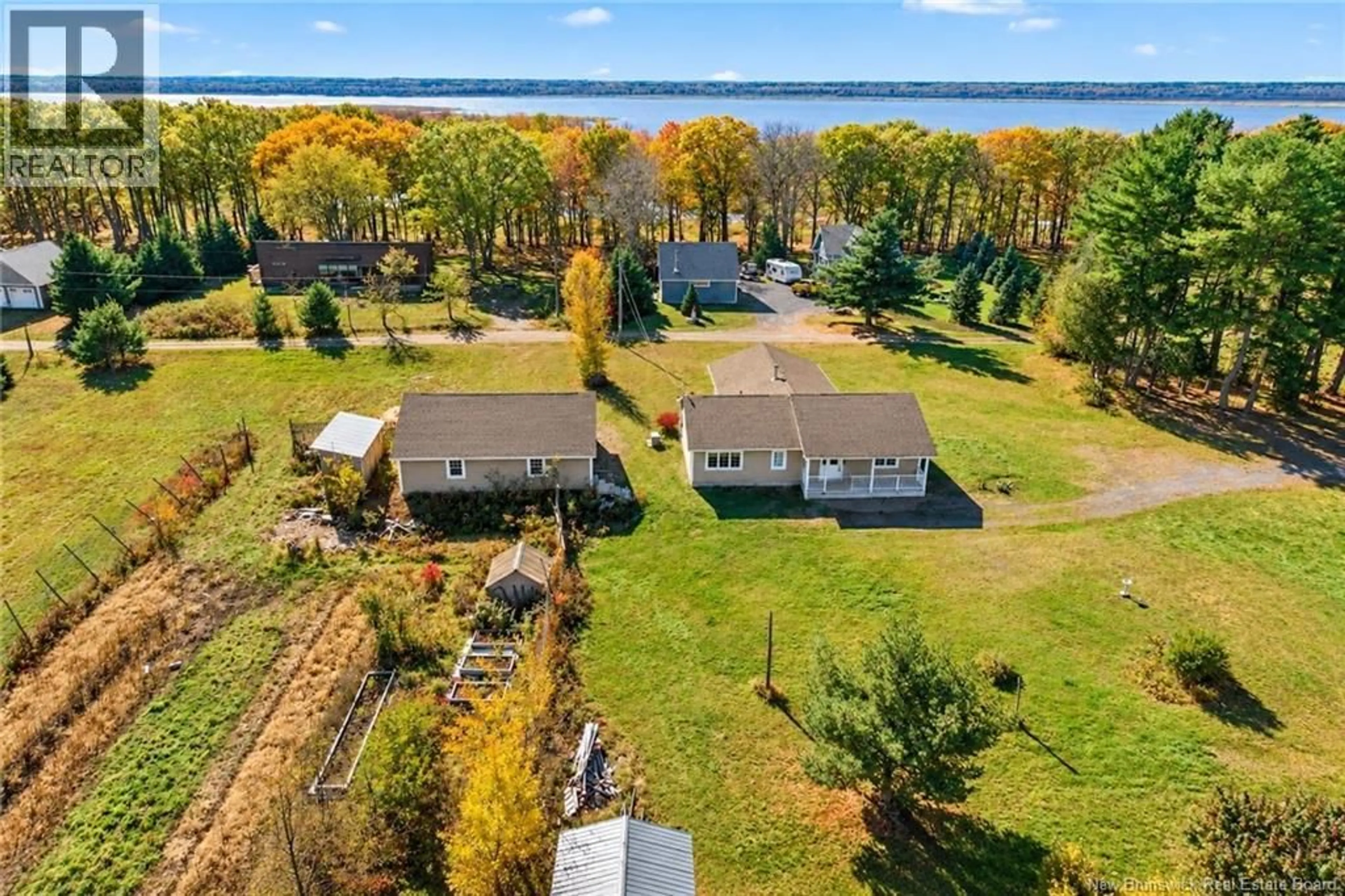 A pic from outside/outdoor area/front of a property/back of a property/a pic from drone, water/lake/river/ocean view for 811 SCOTCHTOWN ROAD, Scotchtown New Brunswick E4B4B4