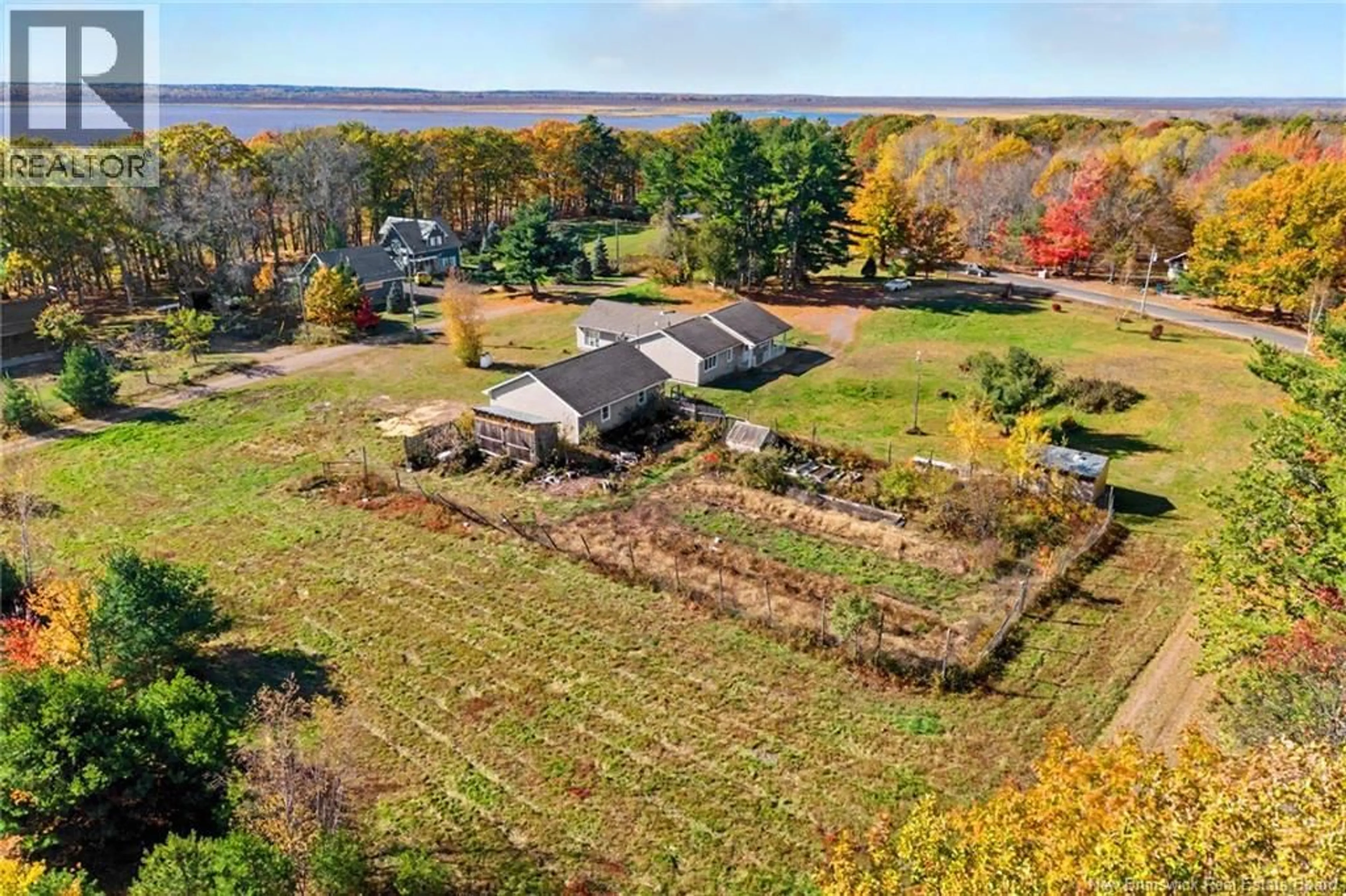 A pic from outside/outdoor area/front of a property/back of a property/a pic from drone, water/lake/river/ocean view for 811 SCOTCHTOWN ROAD, Scotchtown New Brunswick E4B4B4