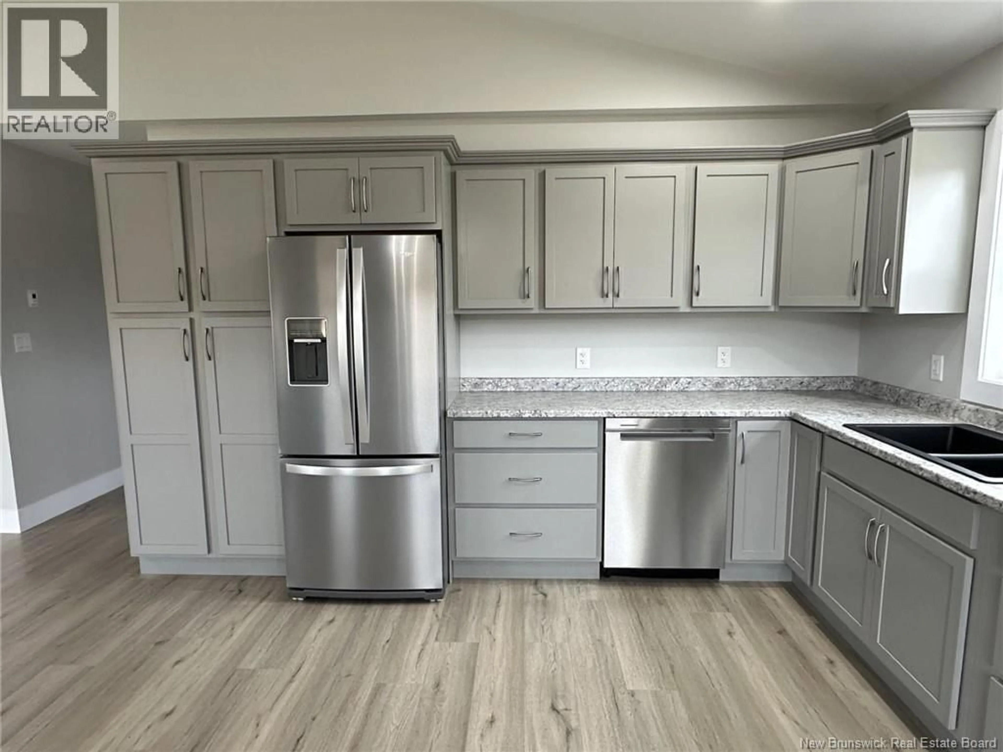 Open concept kitchen, wood/laminate floor for 9740 ROUTE 8, Blissfield New Brunswick E9C1L6