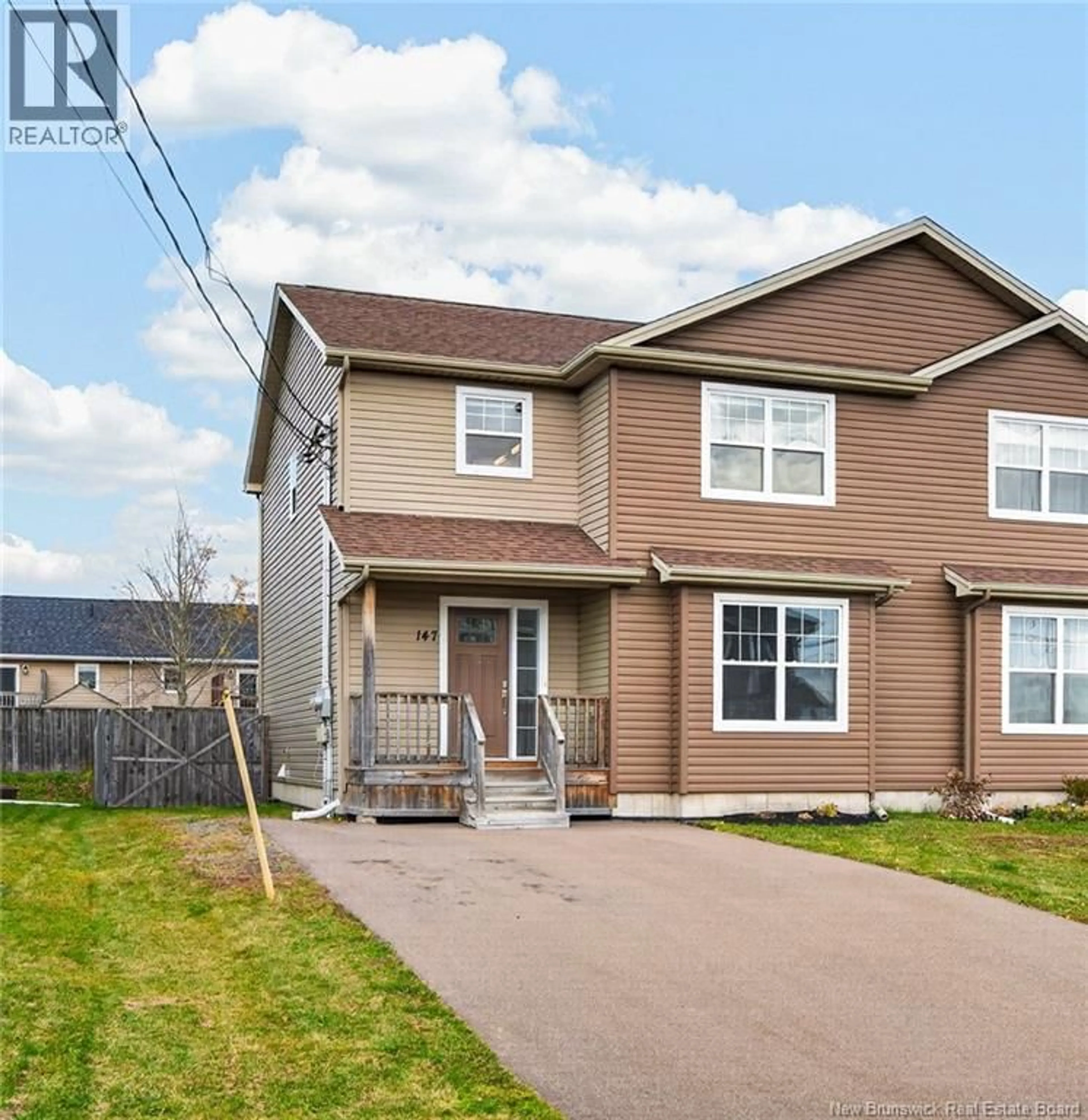 Home with vinyl exterior material, street for 147 SURETTE STREET, Dieppe New Brunswick E1A9R3