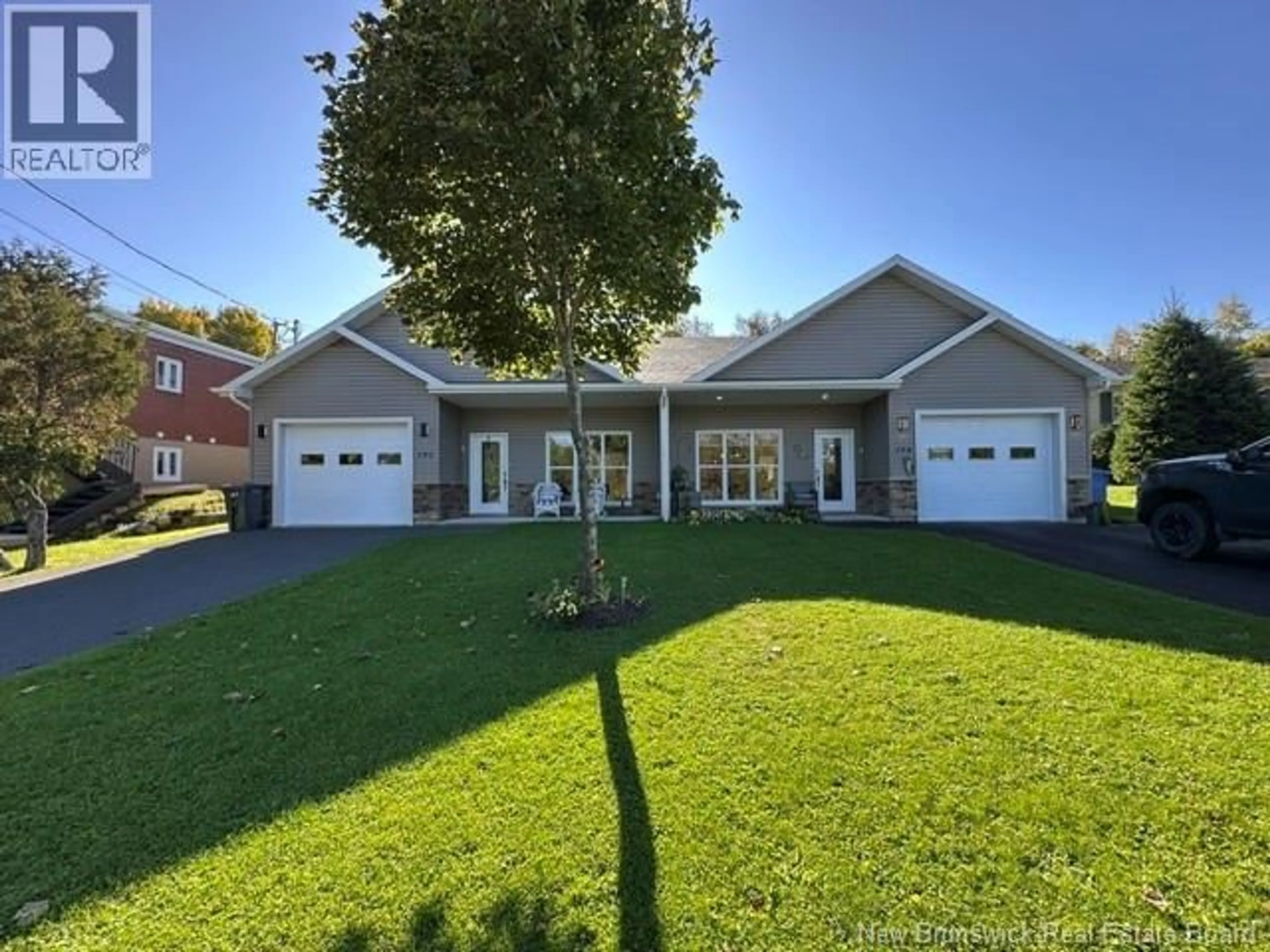 Home with vinyl exterior material, street for 192-194 NOTRE DAME STREET, Atholville New Brunswick E3N3Z7