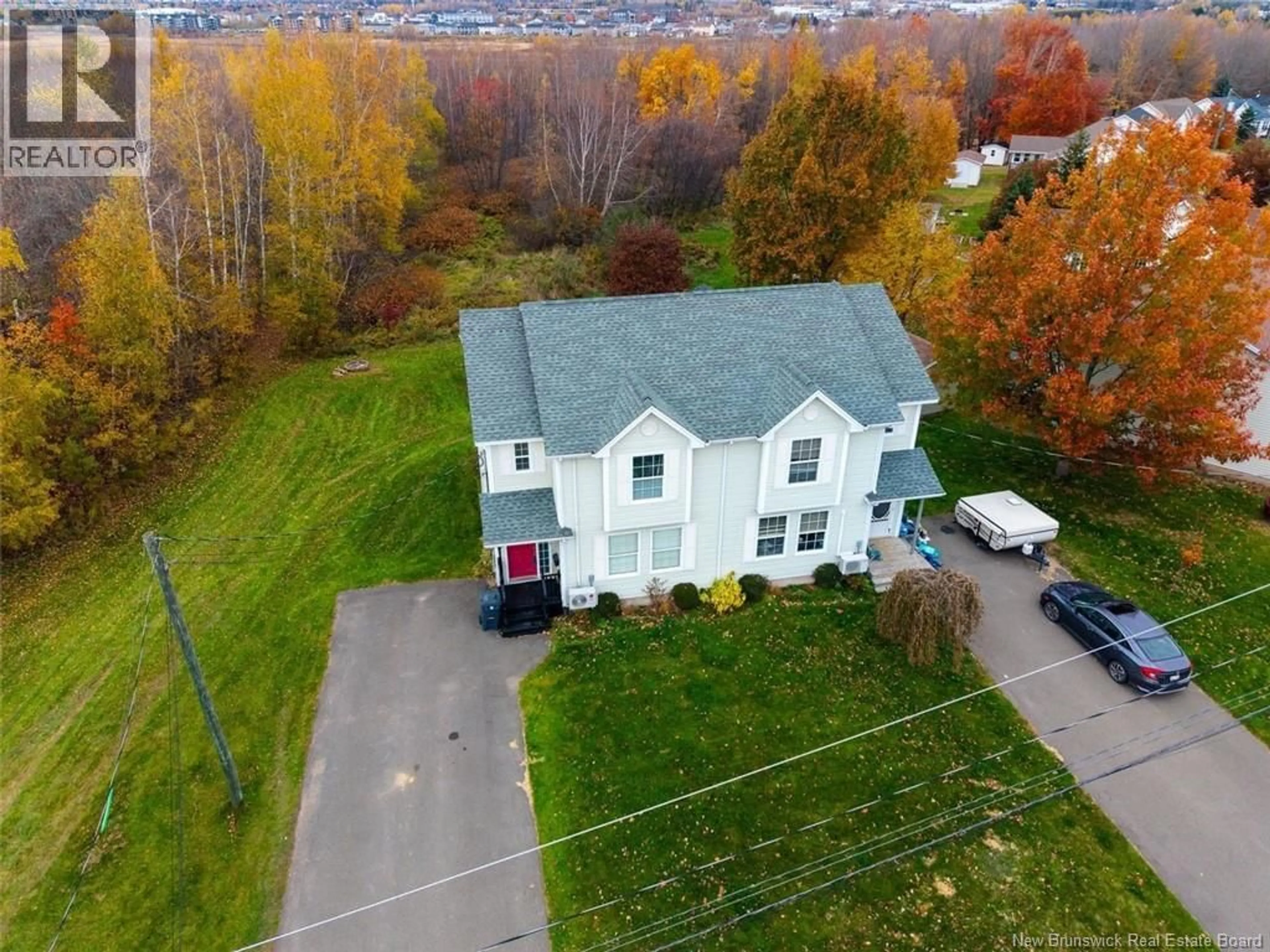 A pic from outside/outdoor area/front of a property/back of a property/a pic from drone, street for 85 BAHAMA STREET, Dieppe New Brunswick E1A7X7