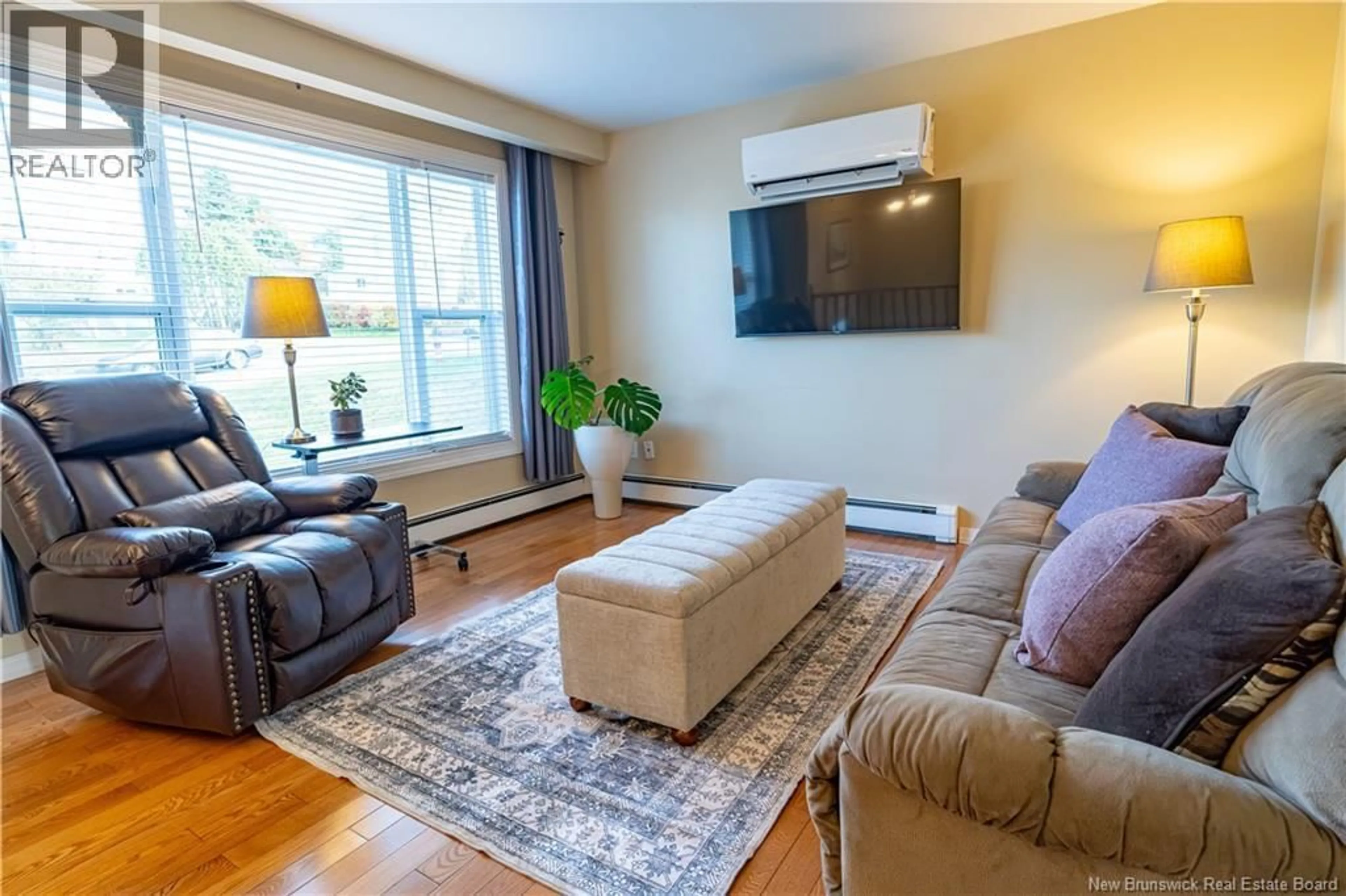 Living room with furniture, wood/laminate floor for 48 BELGRAVE STREET, Saint John New Brunswick E2J1C8