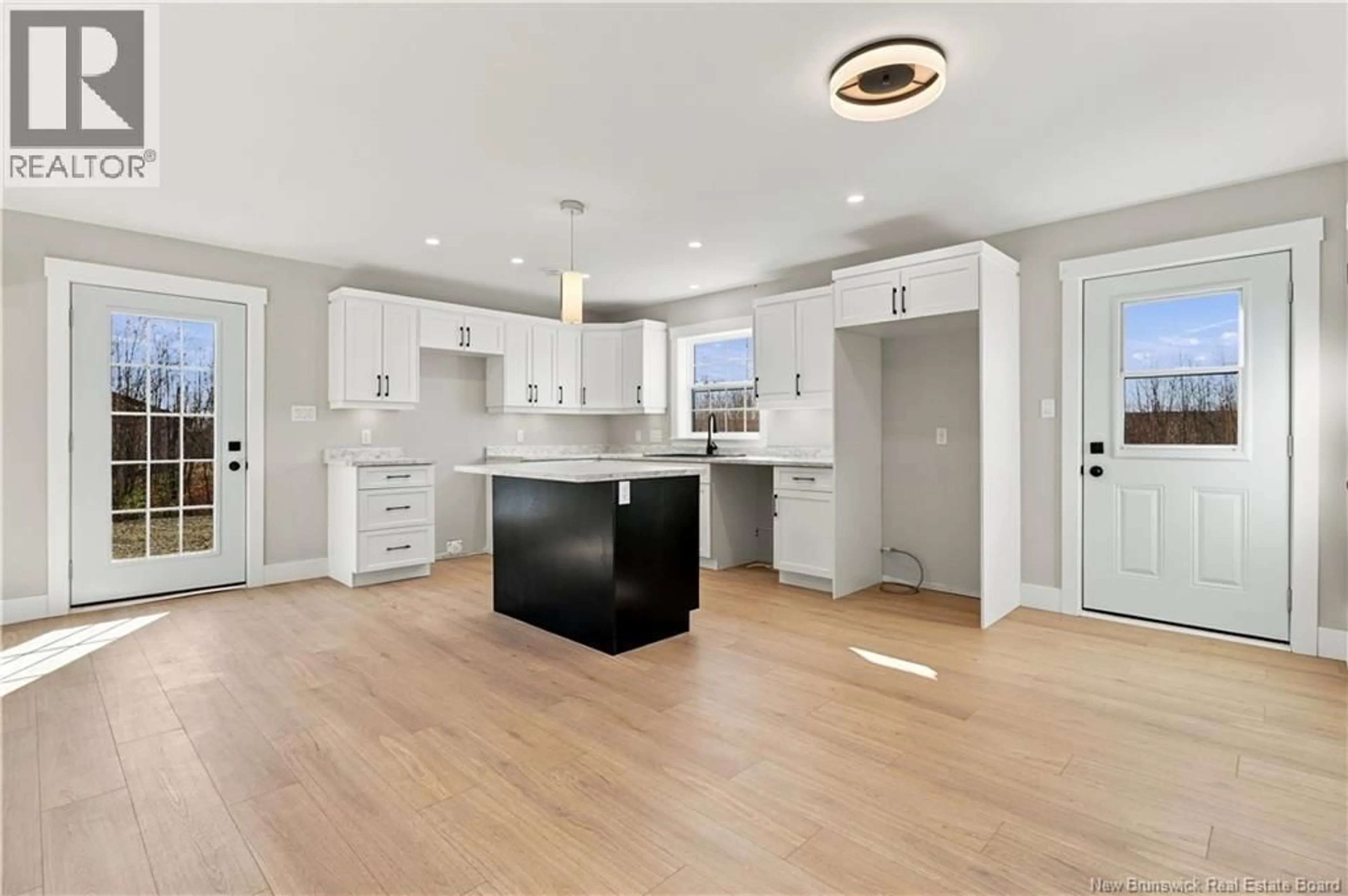 Open concept kitchen, wood/laminate floor for 502 ENGLISH SETTLEMENT ROAD, English Settlement New Brunswick E6B2E9