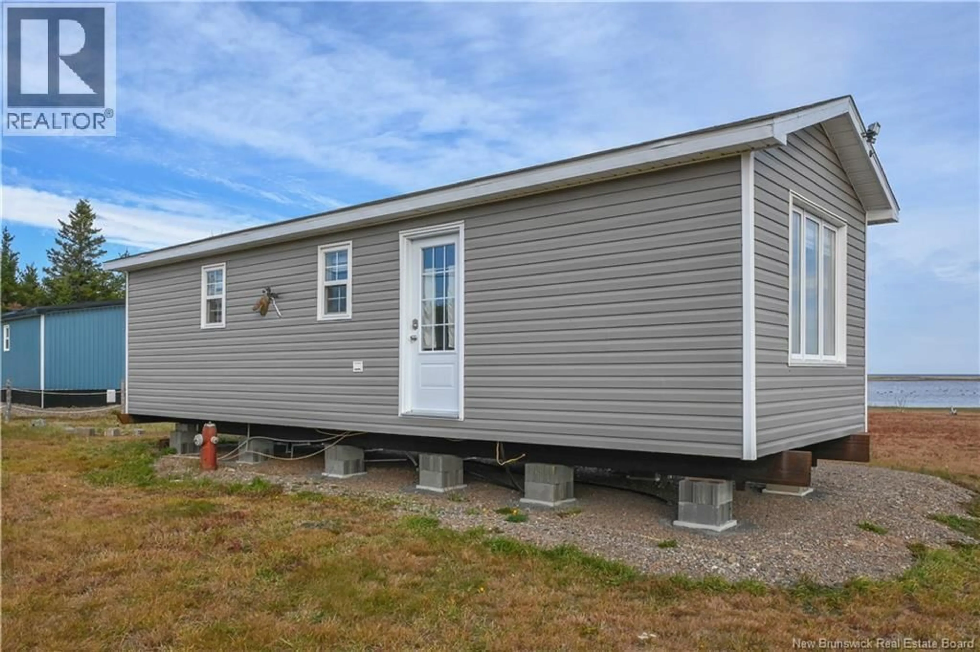 Home with vinyl exterior material, unknown for 0 OLIVIER ROAD, Maisonnette New Brunswick E8N2J7