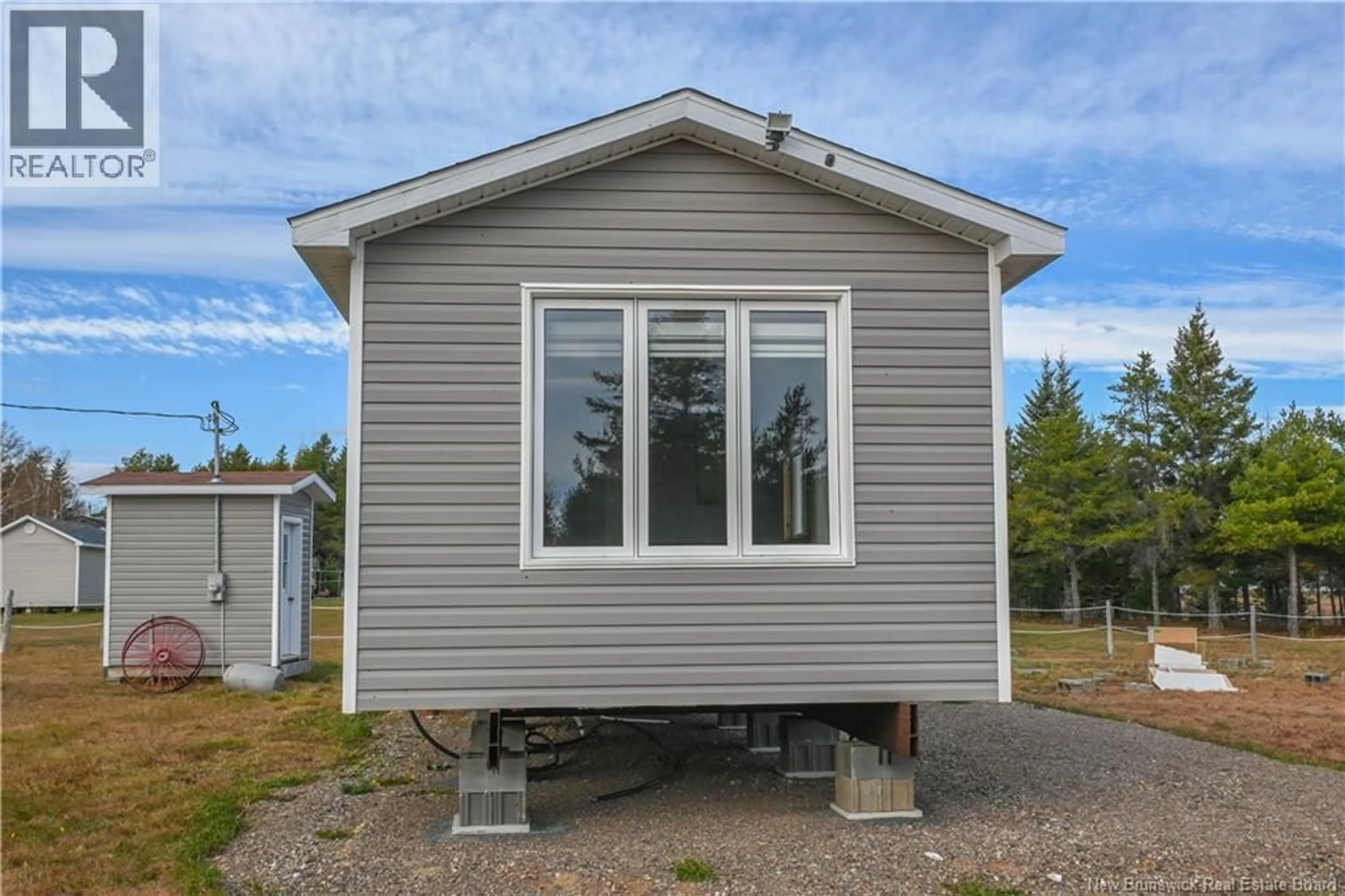 Home with vinyl exterior material, street for 0 OLIVIER ROAD, Maisonnette New Brunswick E8N2J7