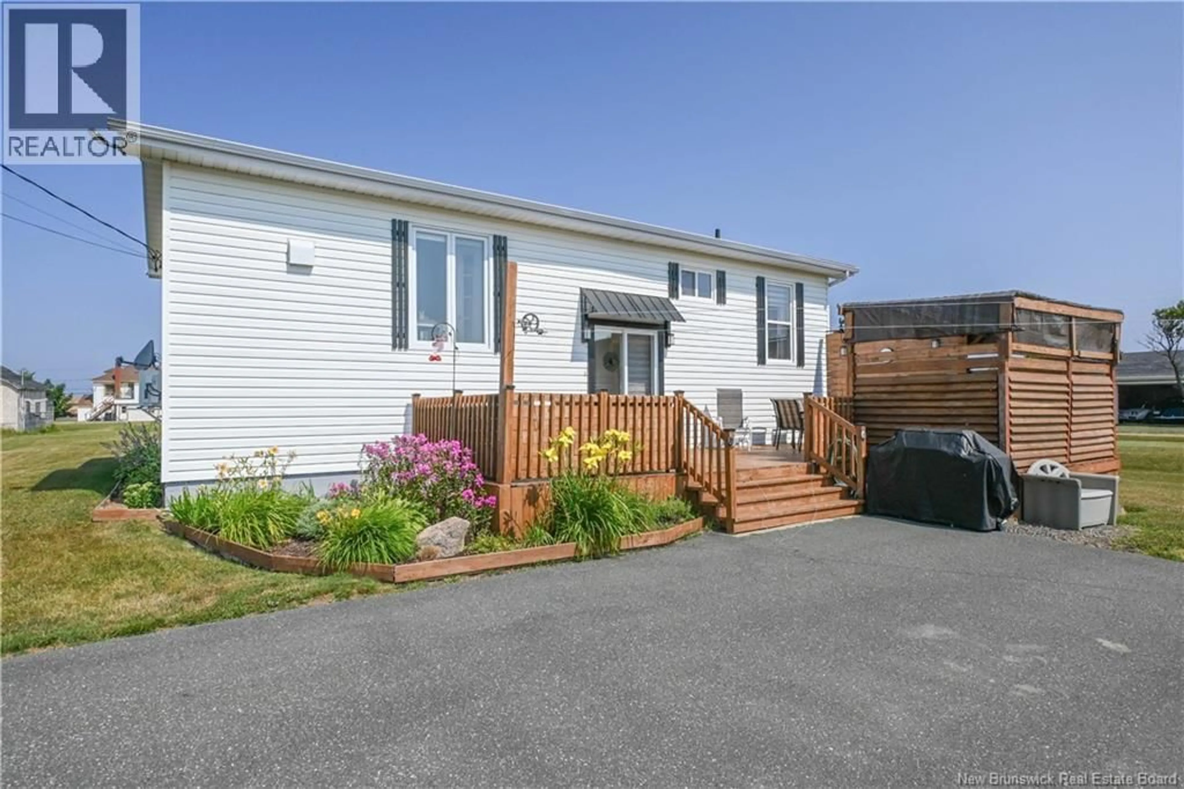 Home with vinyl exterior material, street for 25 DOWNING ROAD, Anse-Bleue New Brunswick E8N2E5