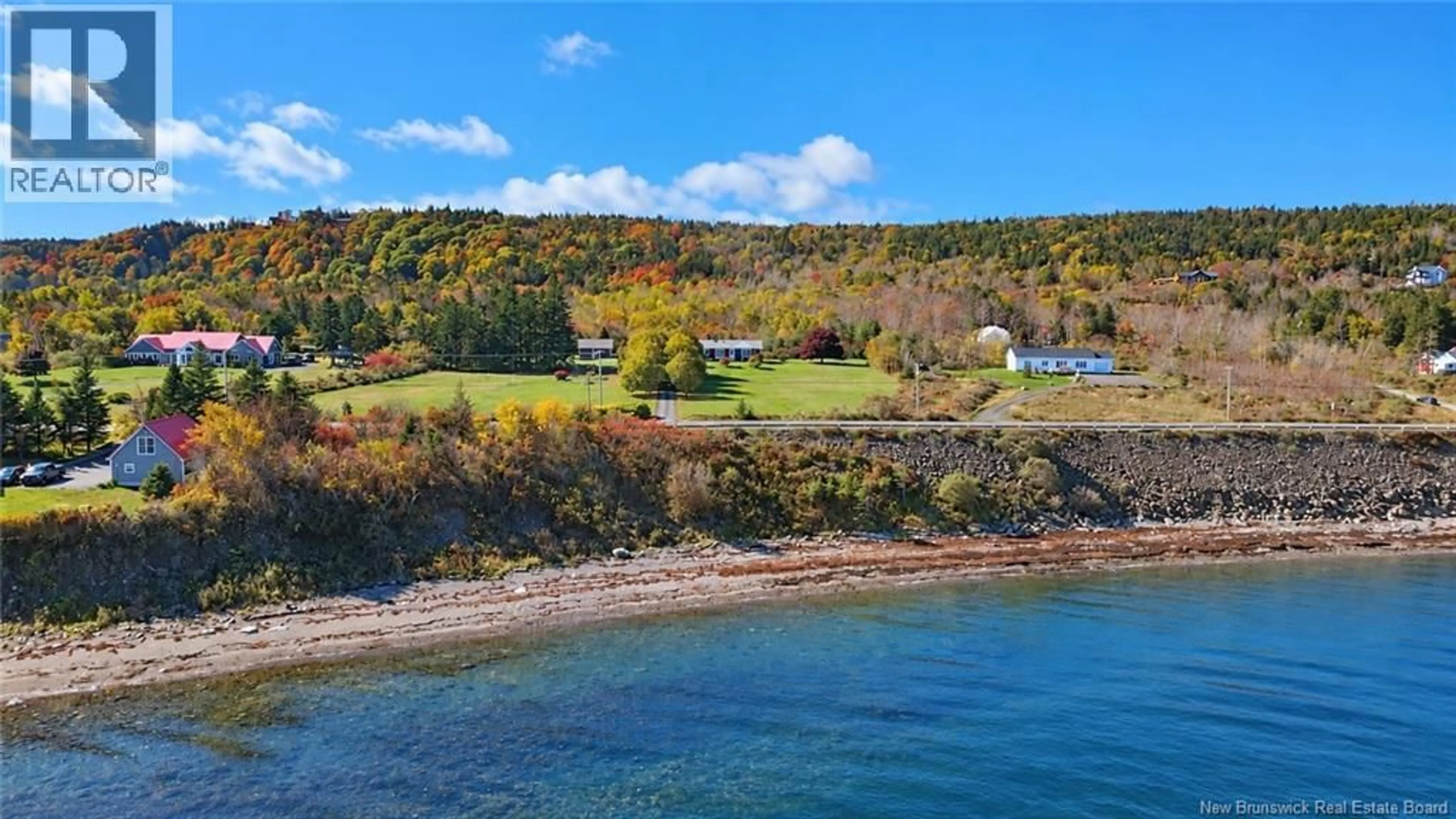 A pic from outside/outdoor area/front of a property/back of a property/a pic from drone, water/lake/river/ocean view for 390 ROUTE 776, Grand Manan New Brunswick E5G1C8