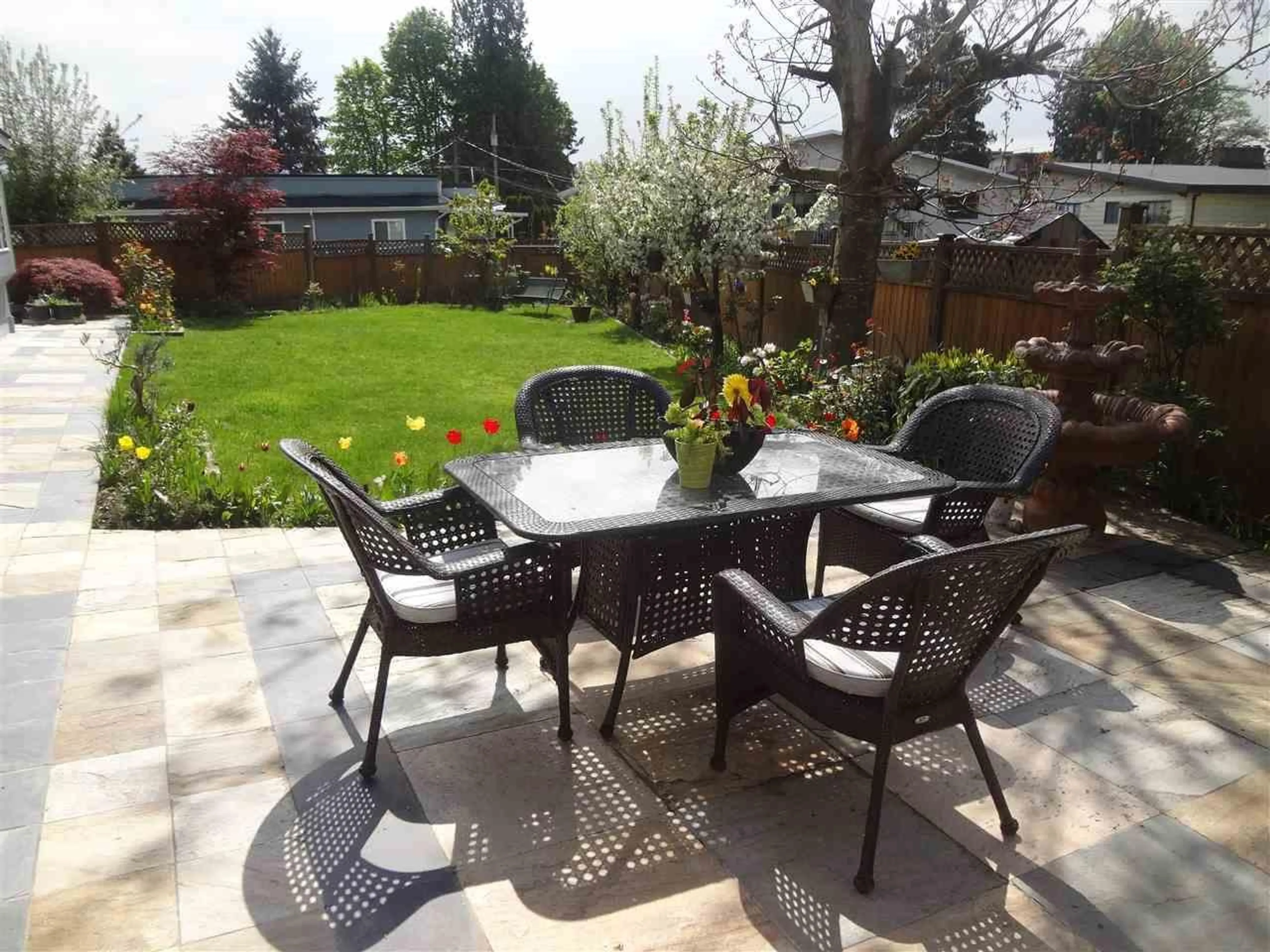 Patio, the fenced backyard for 7280 15TH AVENUE, Burnaby British Columbia V3N4Z7