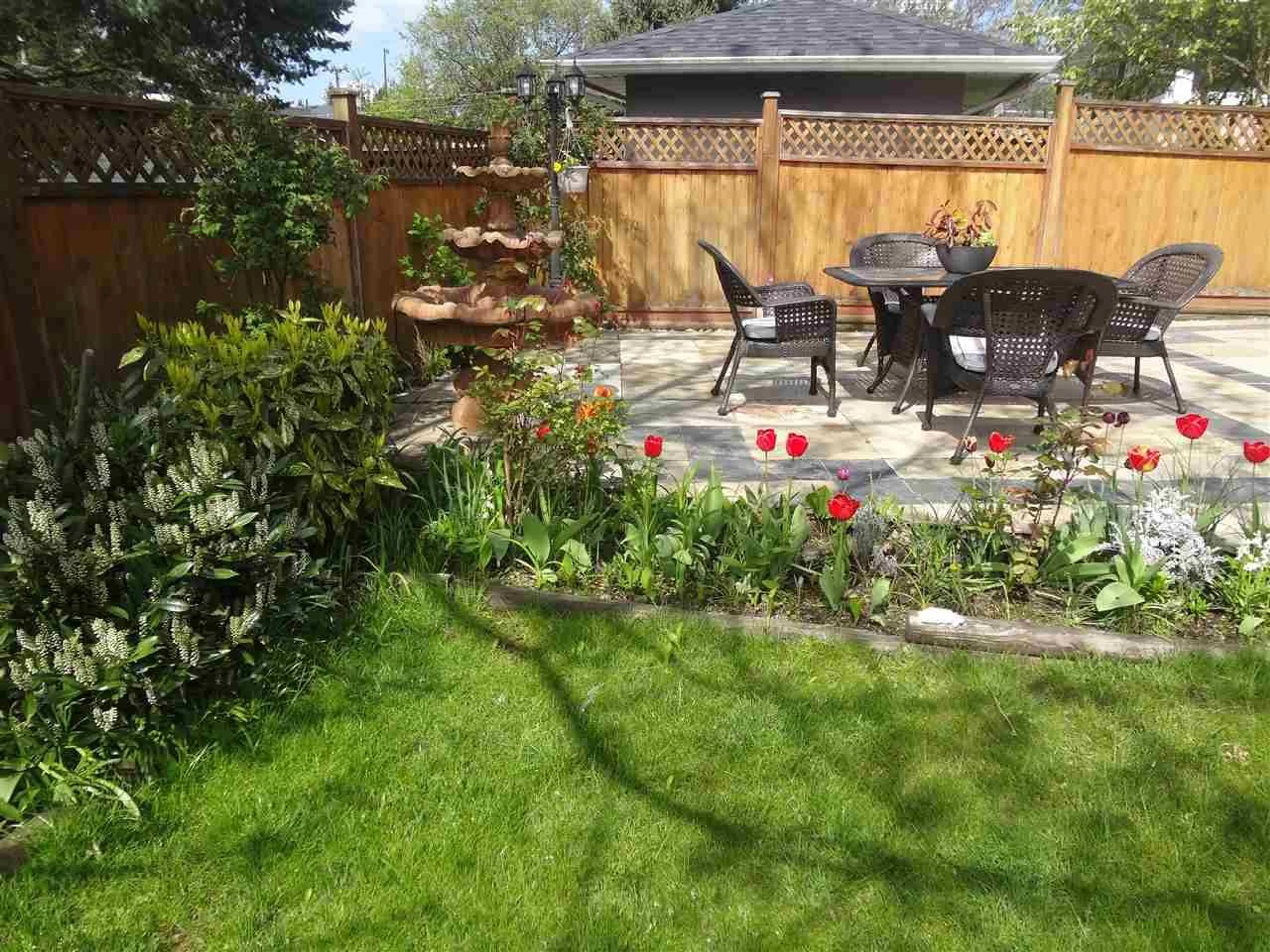 Patio, the fenced backyard for 7280 15TH AVENUE, Burnaby British Columbia V3N4Z7