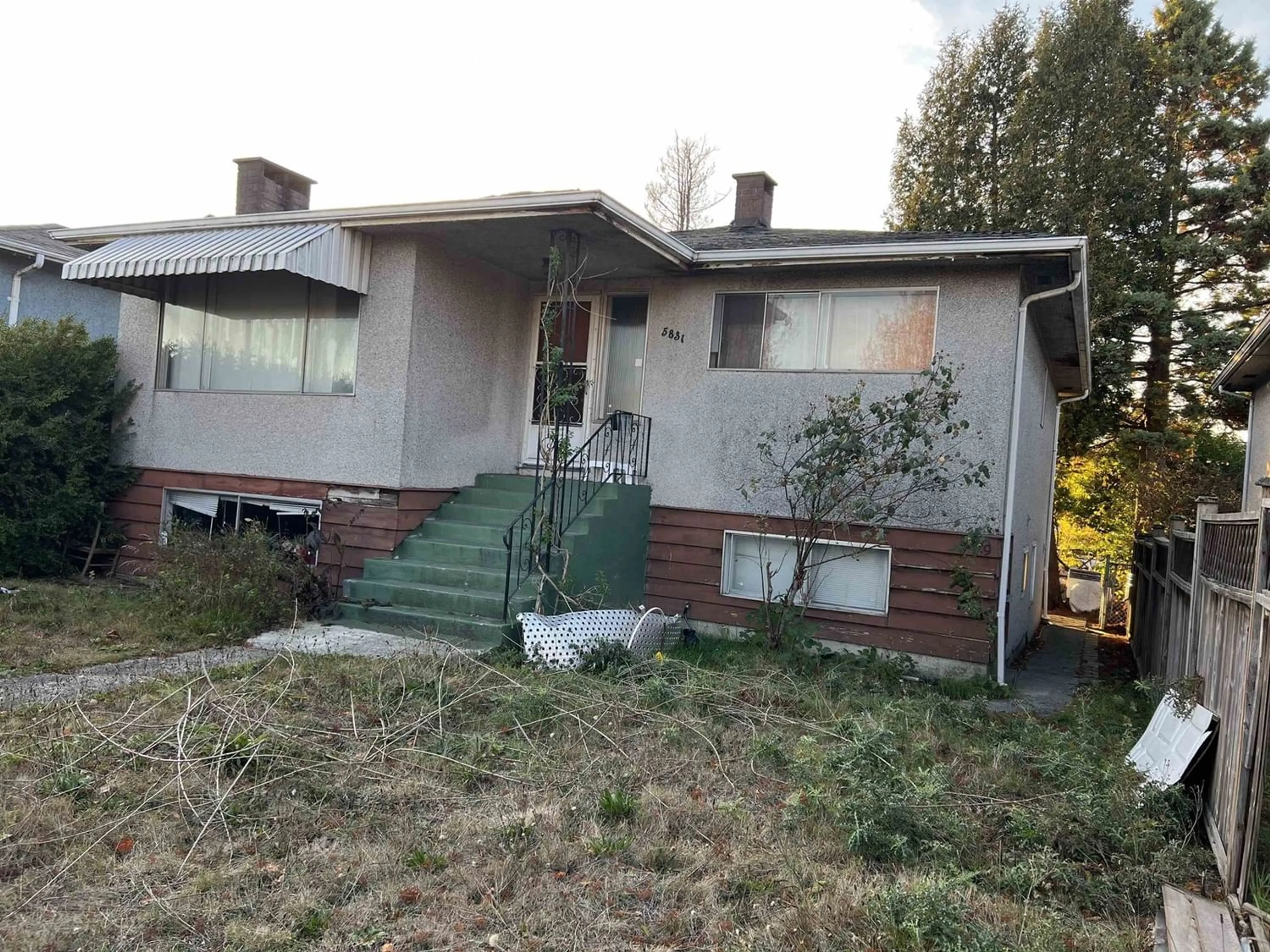 Frontside or backside of a home for 5831 KNIGHT STREET, Vancouver British Columbia V5P2V4
