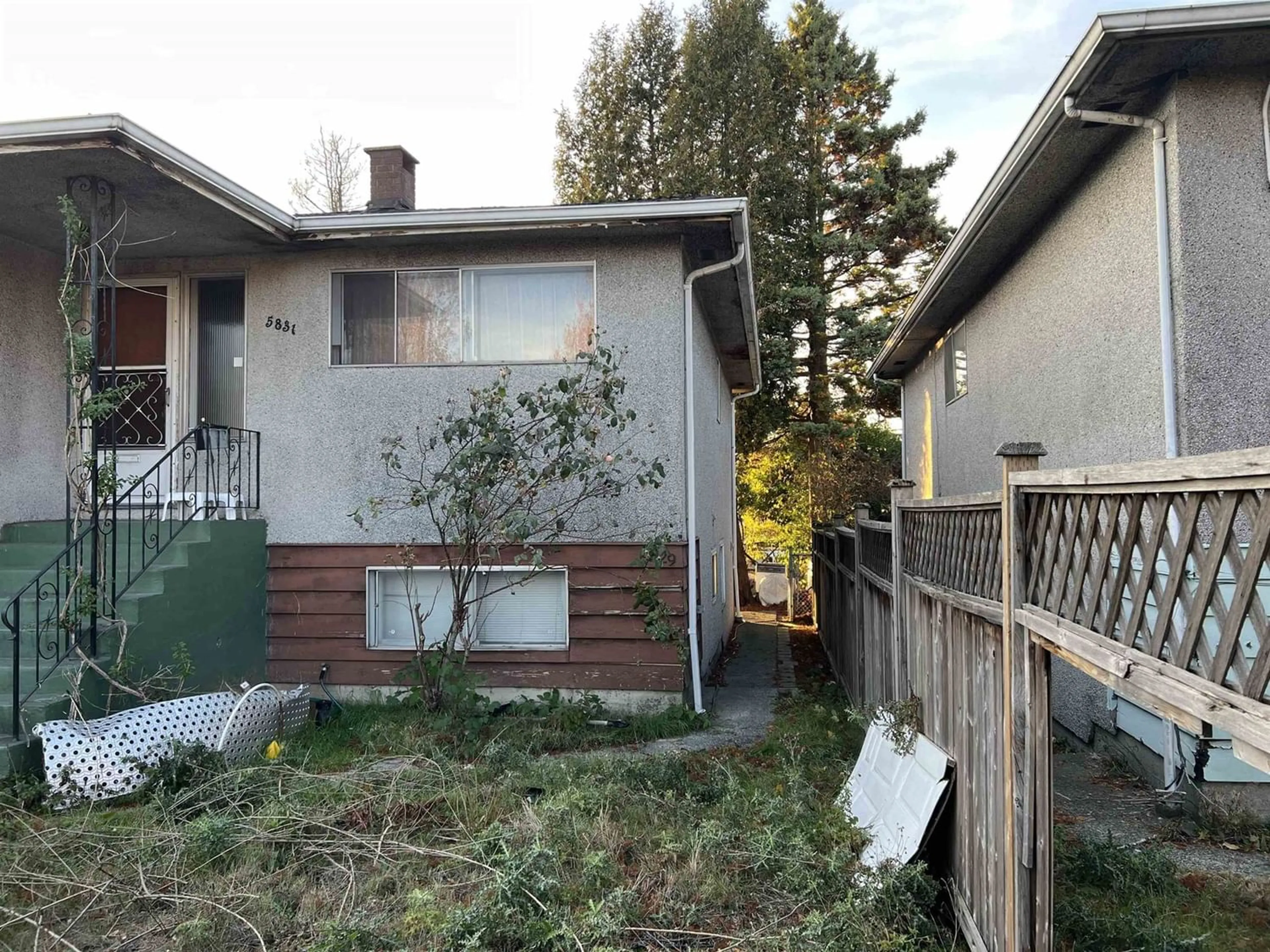 Frontside or backside of a home for 5831 KNIGHT STREET, Vancouver British Columbia V5P2V4