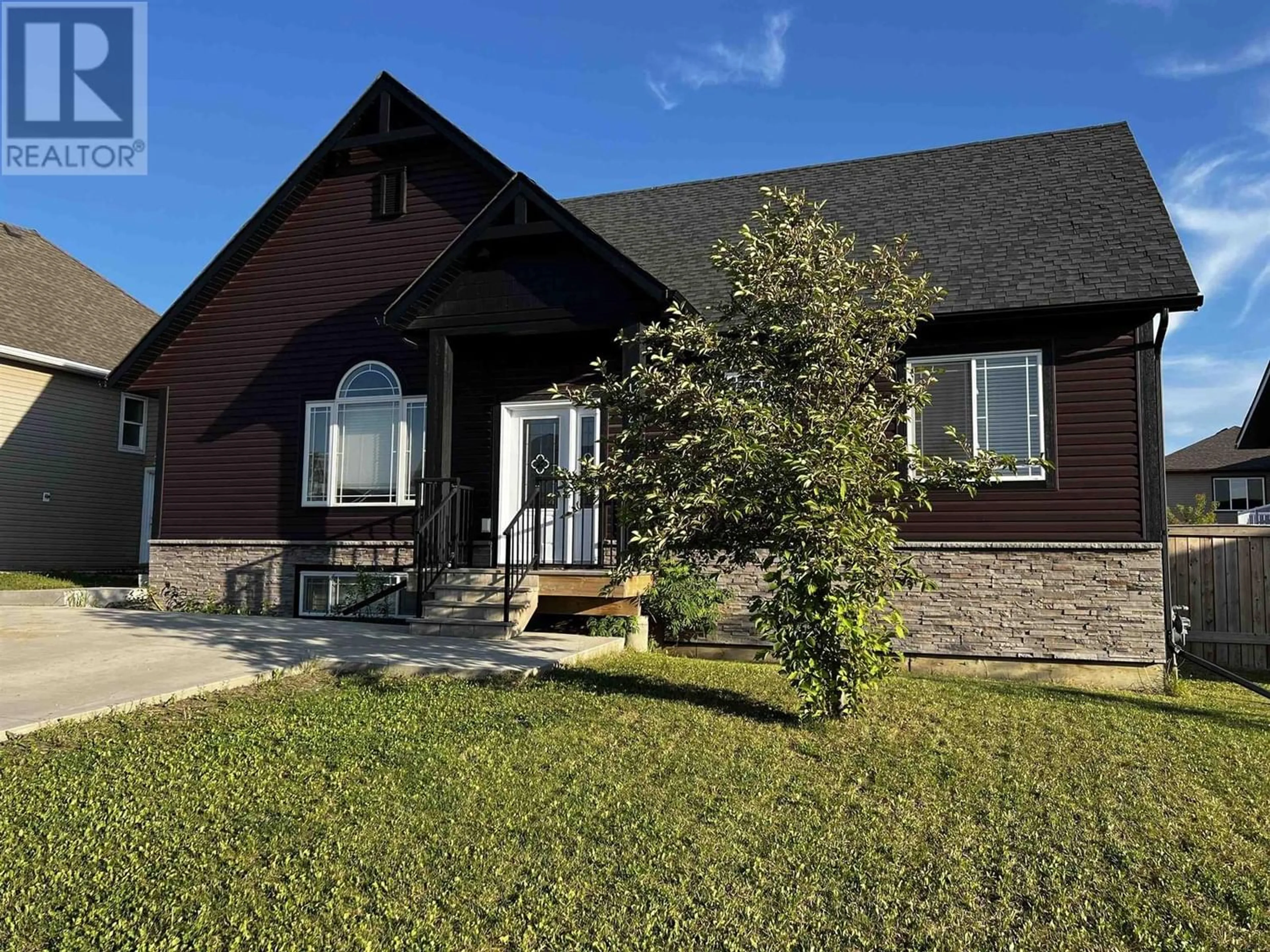 Frontside or backside of a home for 10923 105 AVENUE, Fort St. John British Columbia V1J0L2