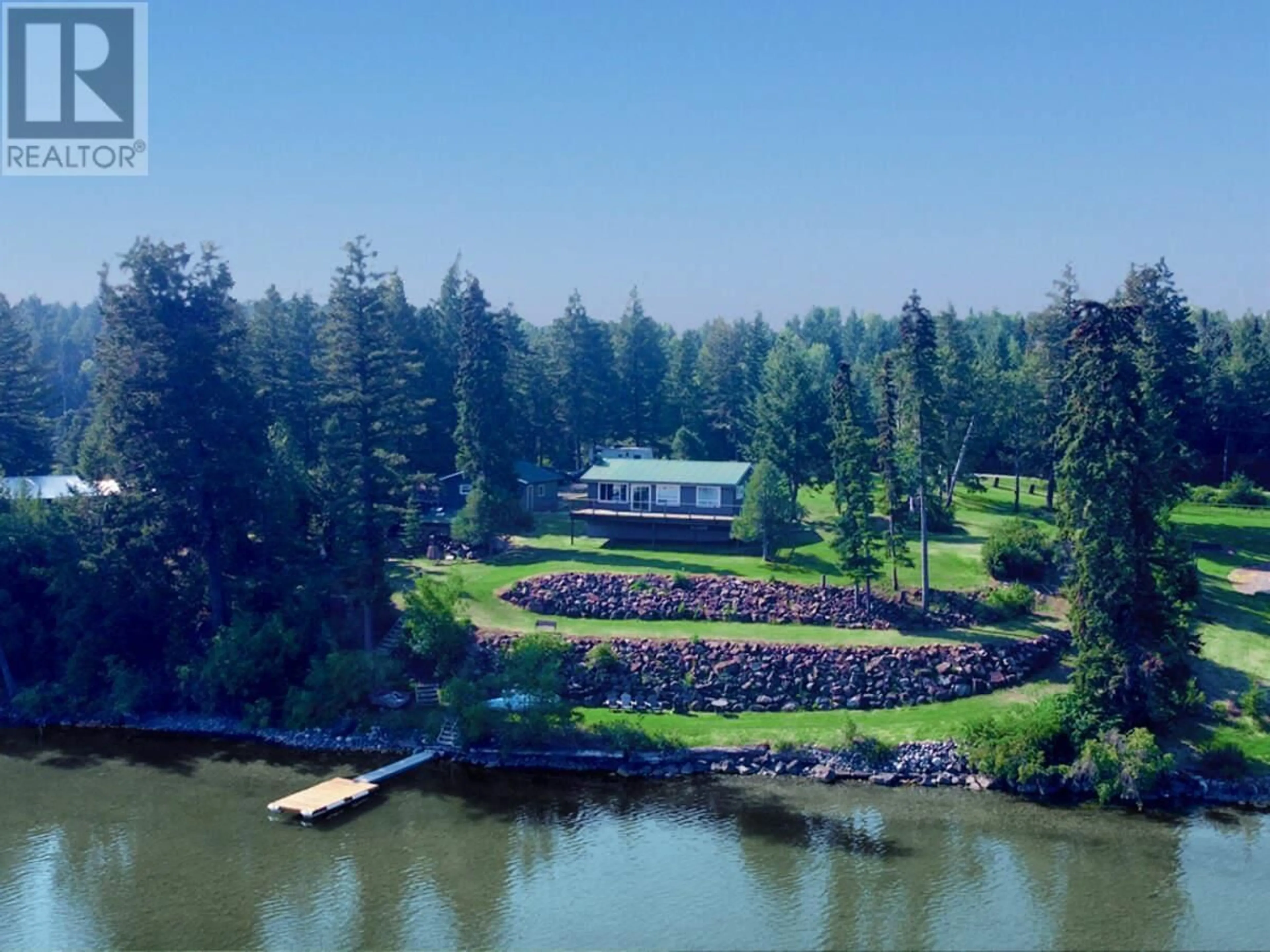 A pic from outside/outdoor area/front of a property/back of a property/a pic from drone, water/lake/river/ocean view for 4803 LAKEVIEW ROAD, Lac La Hache British Columbia V0K1T0