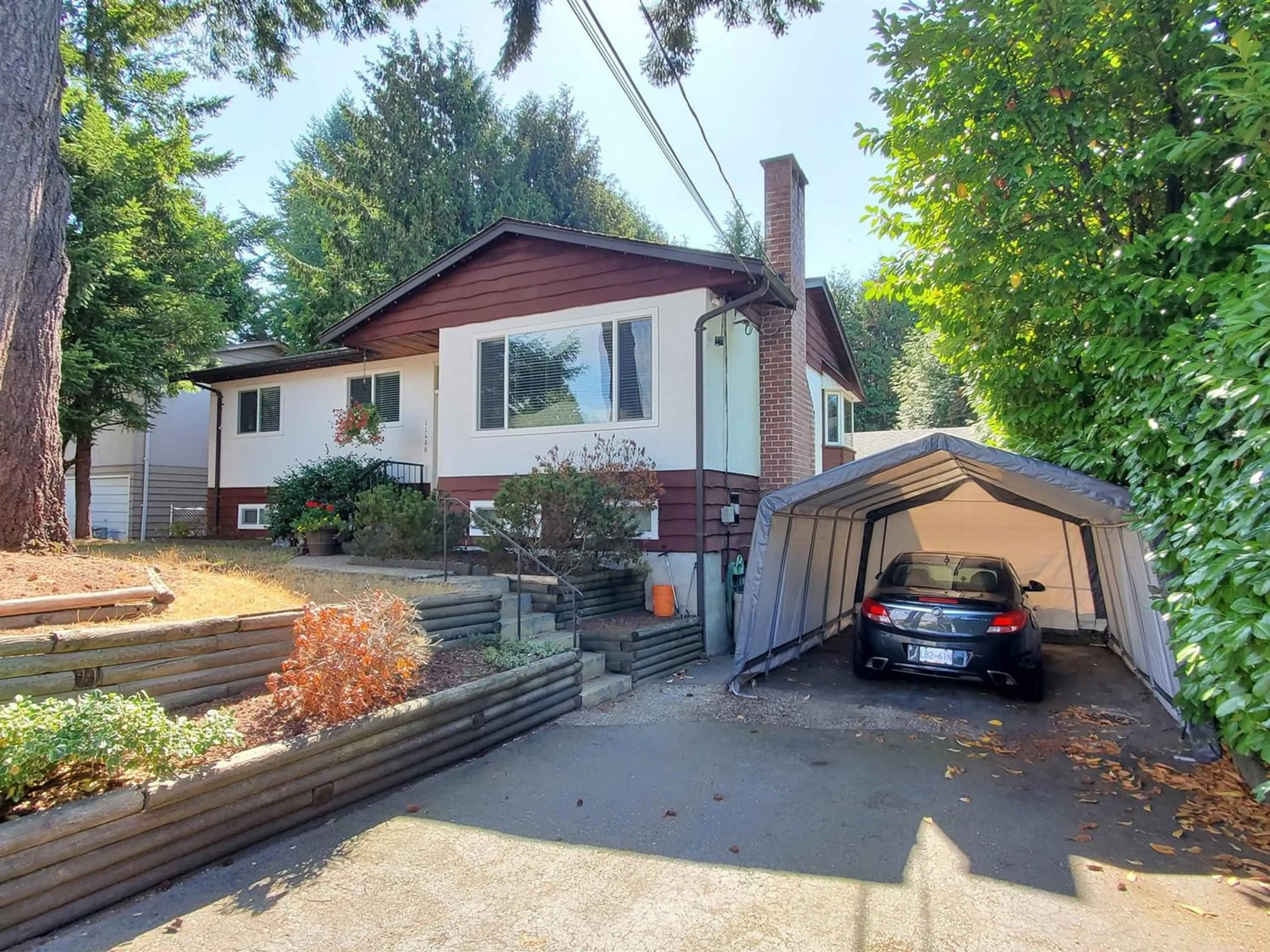 Frontside or backside of a home for 11406 88A AVENUE, Delta British Columbia V4C3E4