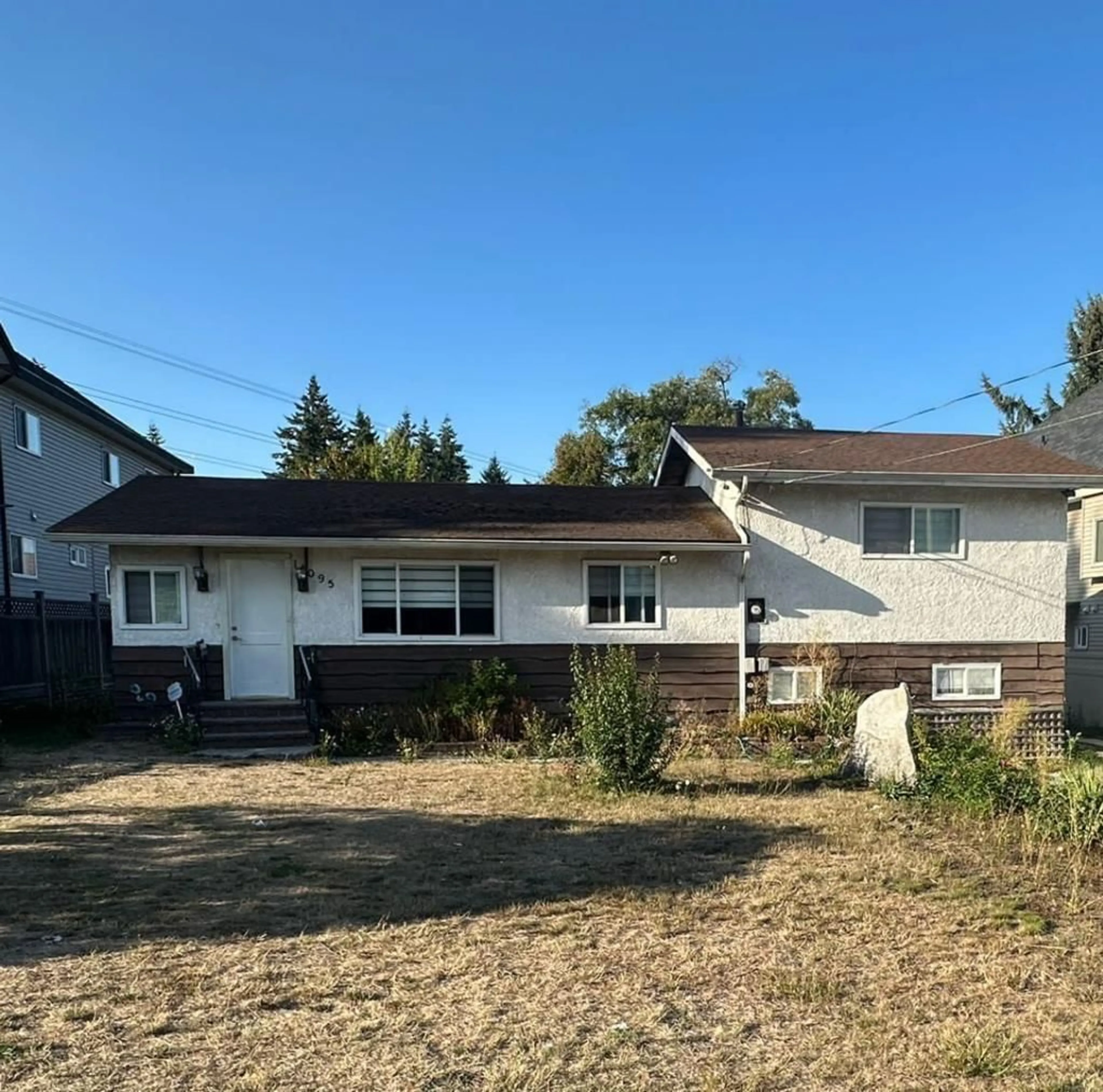 Frontside or backside of a home for 14095 110 AVENUE, Surrey British Columbia V3R1Z3