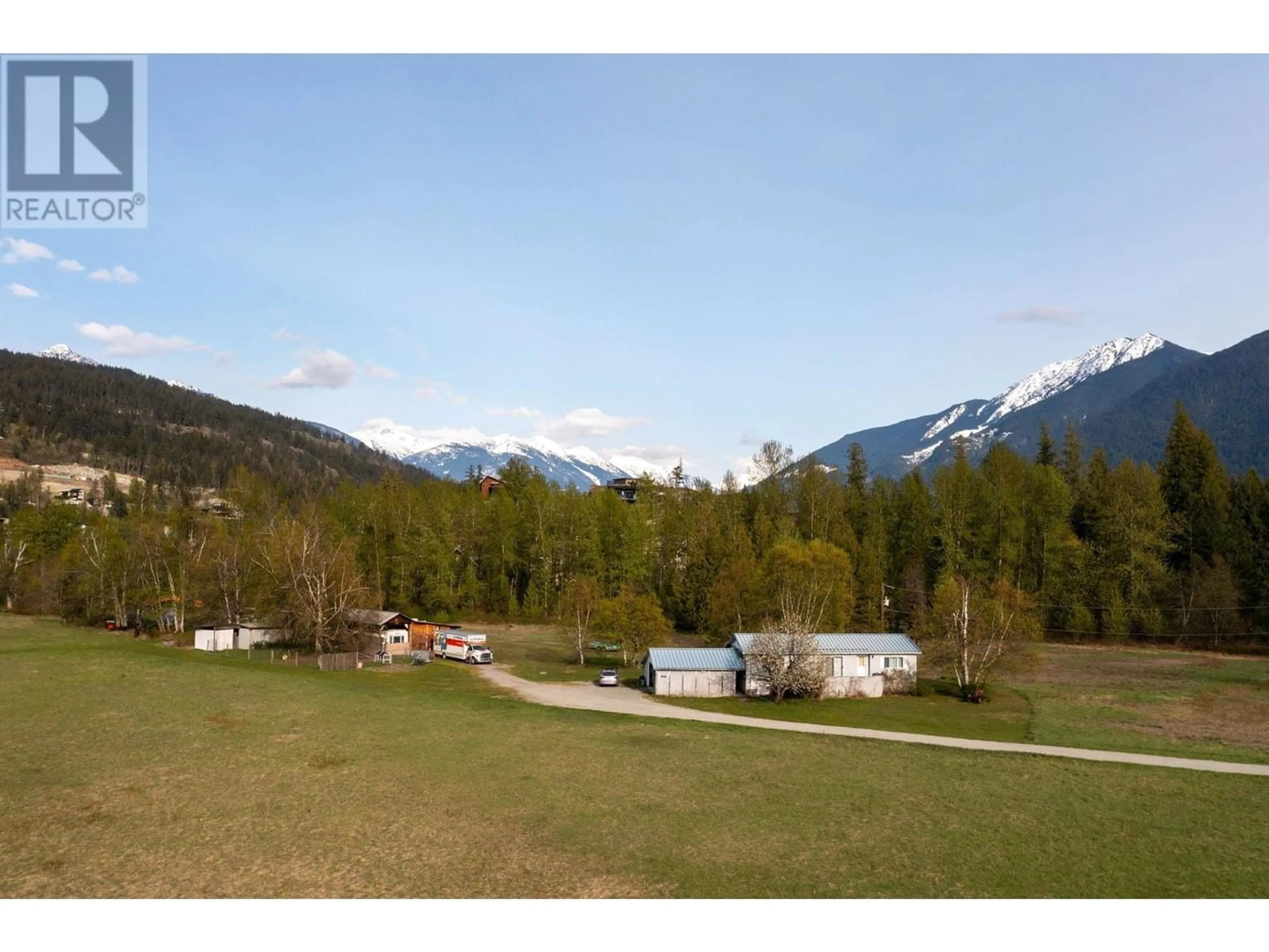 A pic from outside/outdoor area/front of a property/back of a property/a pic from drone, mountain view for 1691 HIGHWAY 99, Pemberton British Columbia V0N2L2