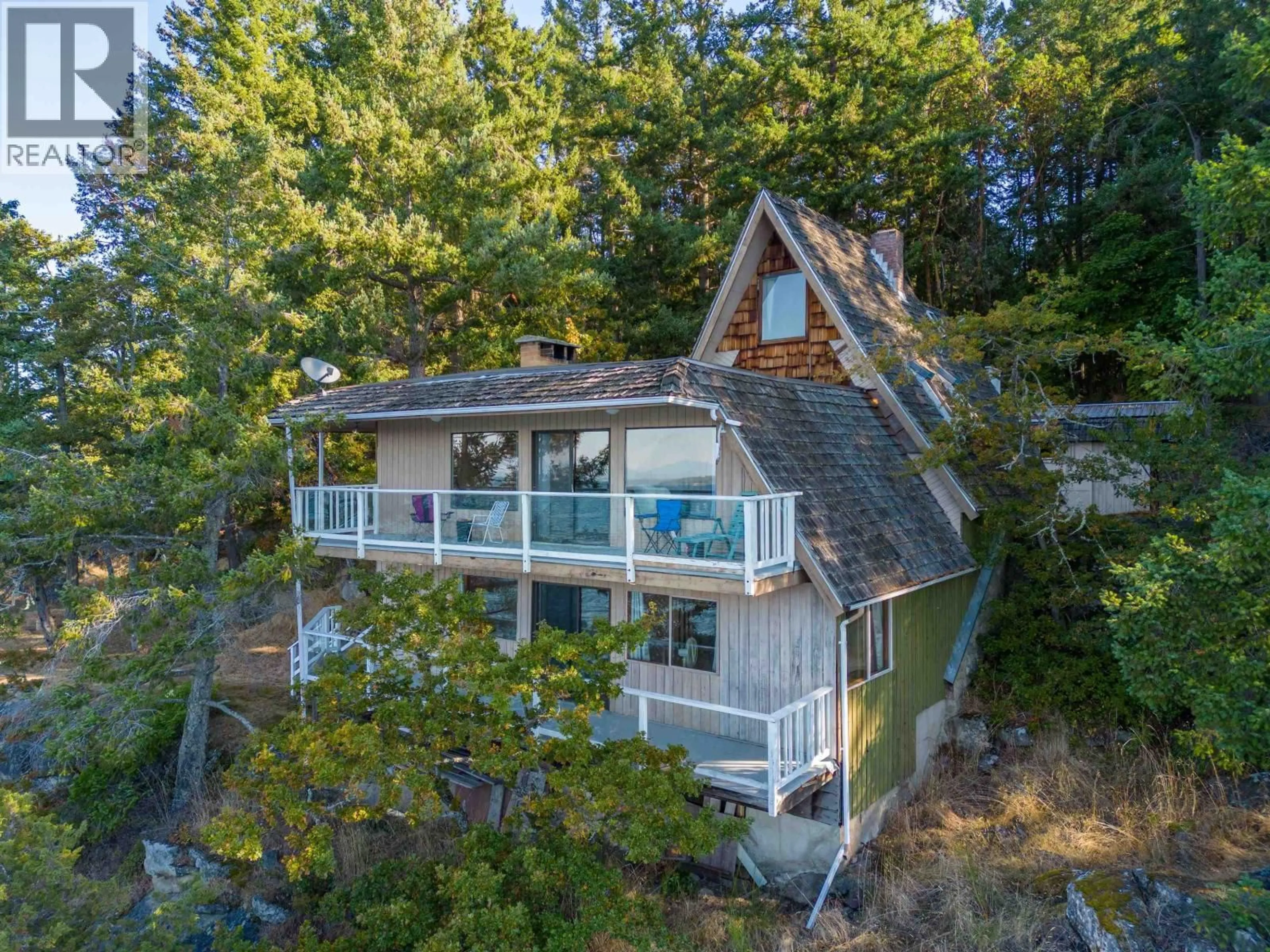 A pic from outside/outdoor area/front of a property/back of a property/a pic from drone, water/lake/river/ocean view for 315 DEACON LANE, Galiano Island British Columbia V0N1P0