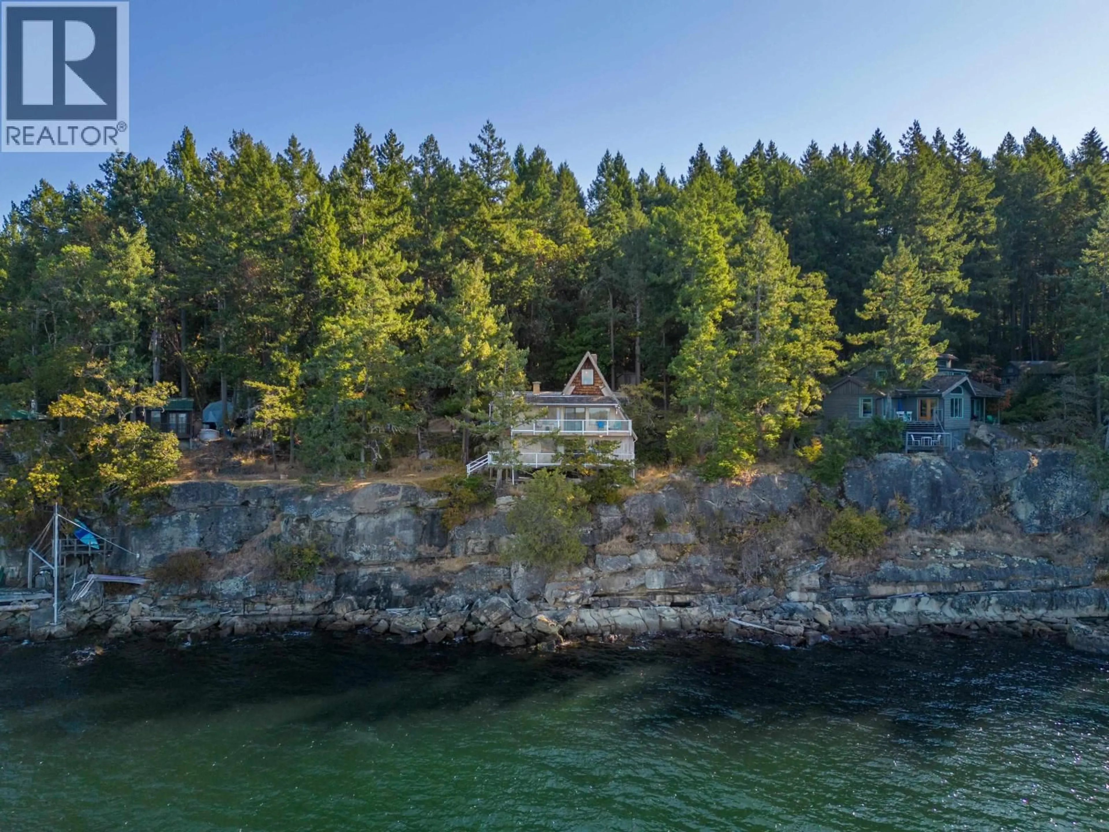 A pic from outside/outdoor area/front of a property/back of a property/a pic from drone, water/lake/river/ocean view for 315 DEACON LANE, Galiano Island British Columbia V0N1P0