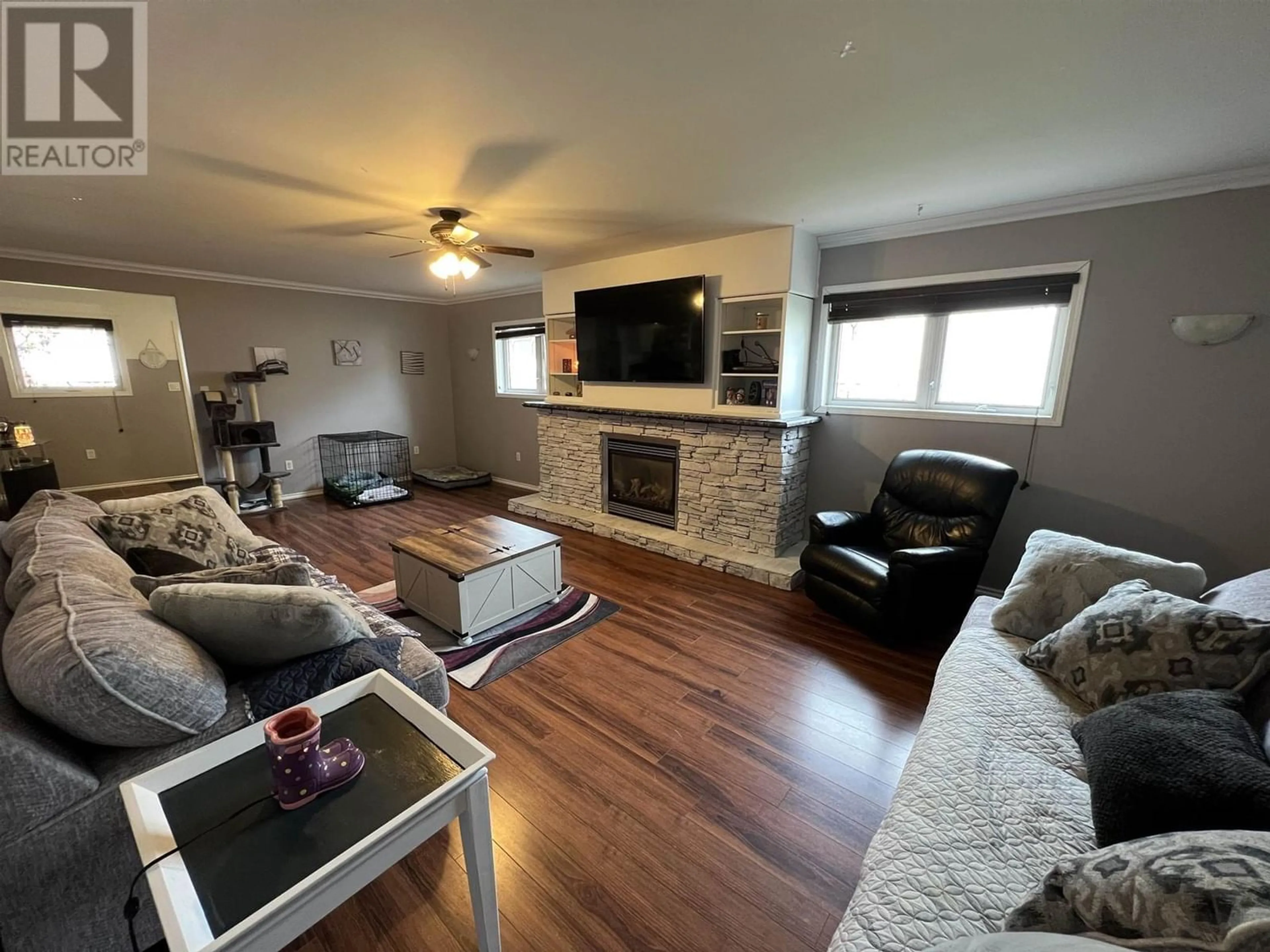 Living room, wood floors for 5228 40 STREET, Fort Nelson British Columbia V0C1R0