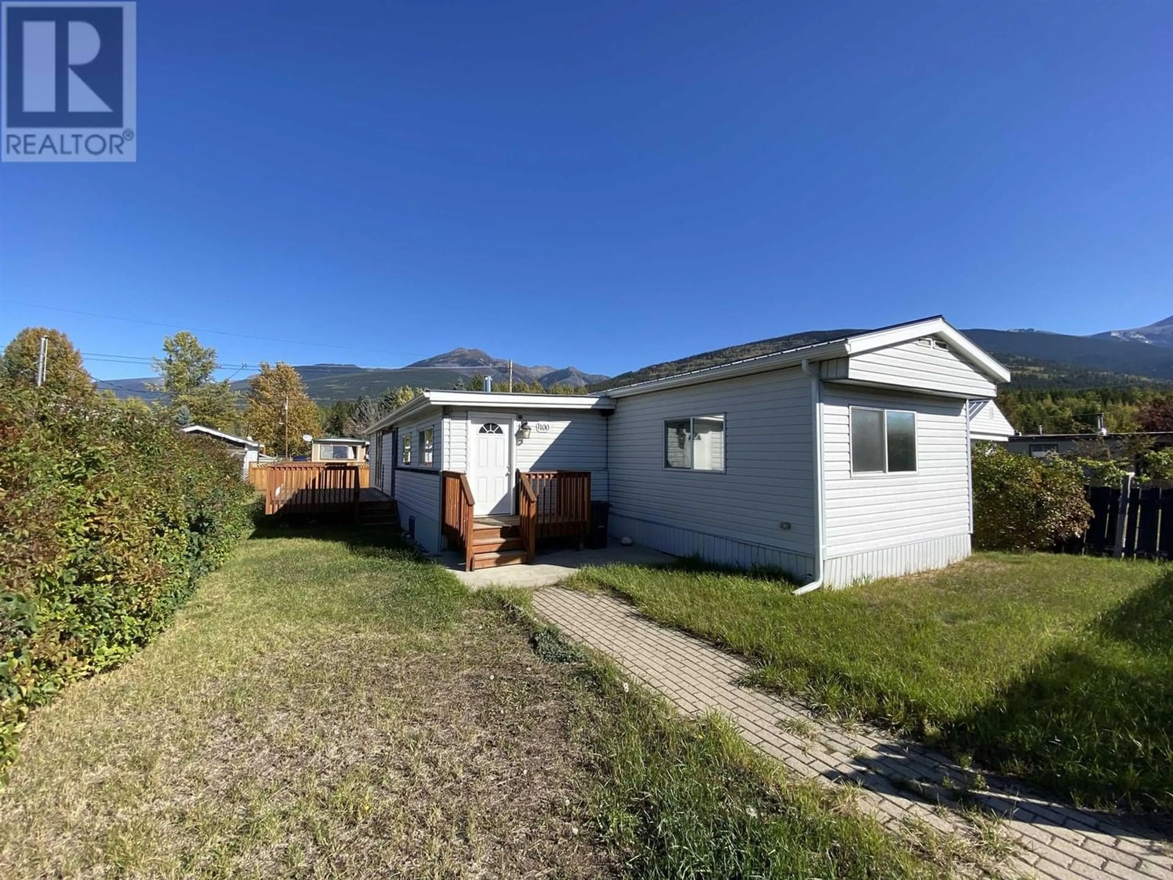 Frontside or backside of a home for 1100 4TH AVENUE, Valemount British Columbia V0E2Z0