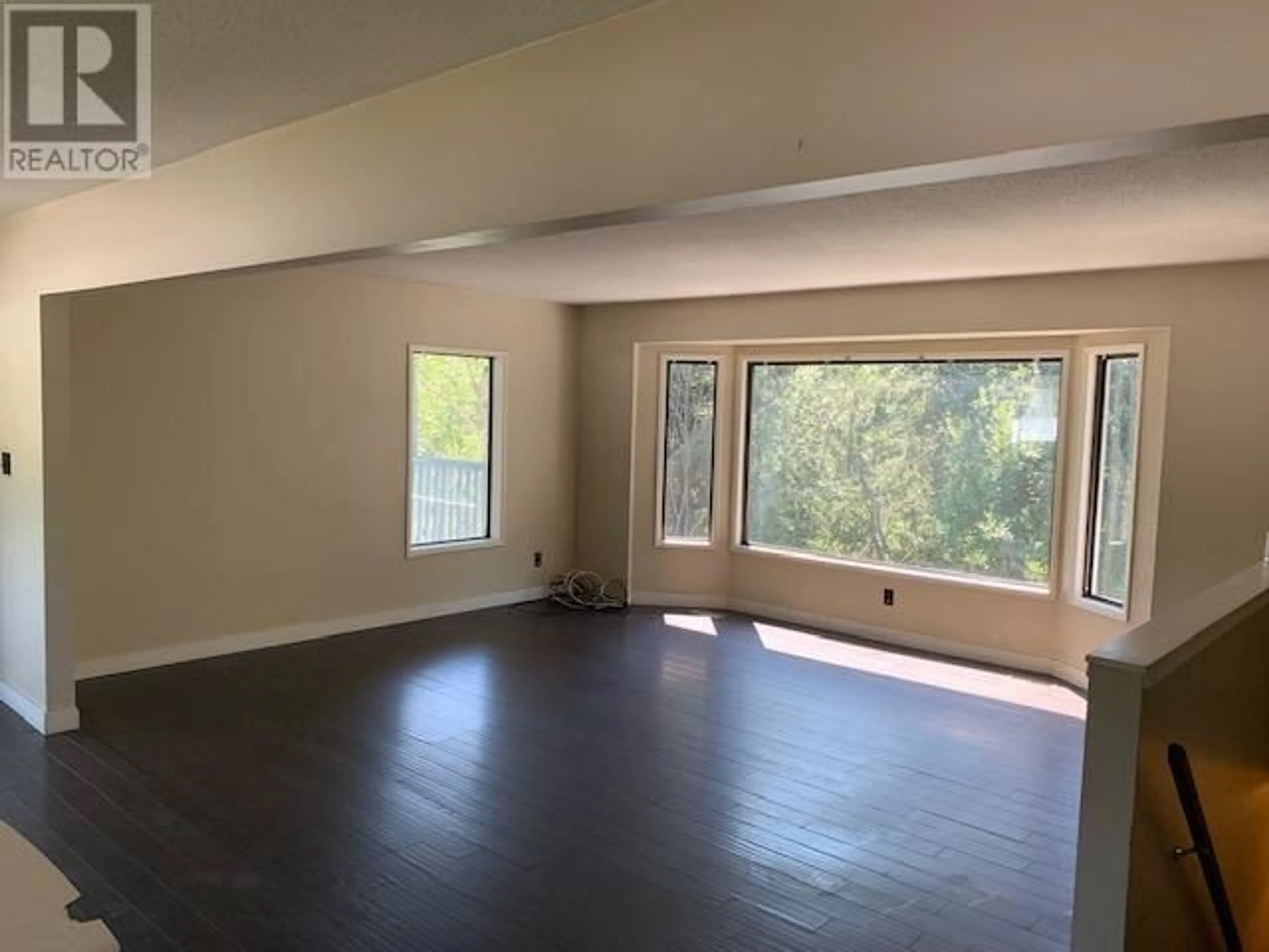 A pic of a room, wood floors for 7506 MAGNUSSEN ROAD, 100 Mile House British Columbia V0K1X1