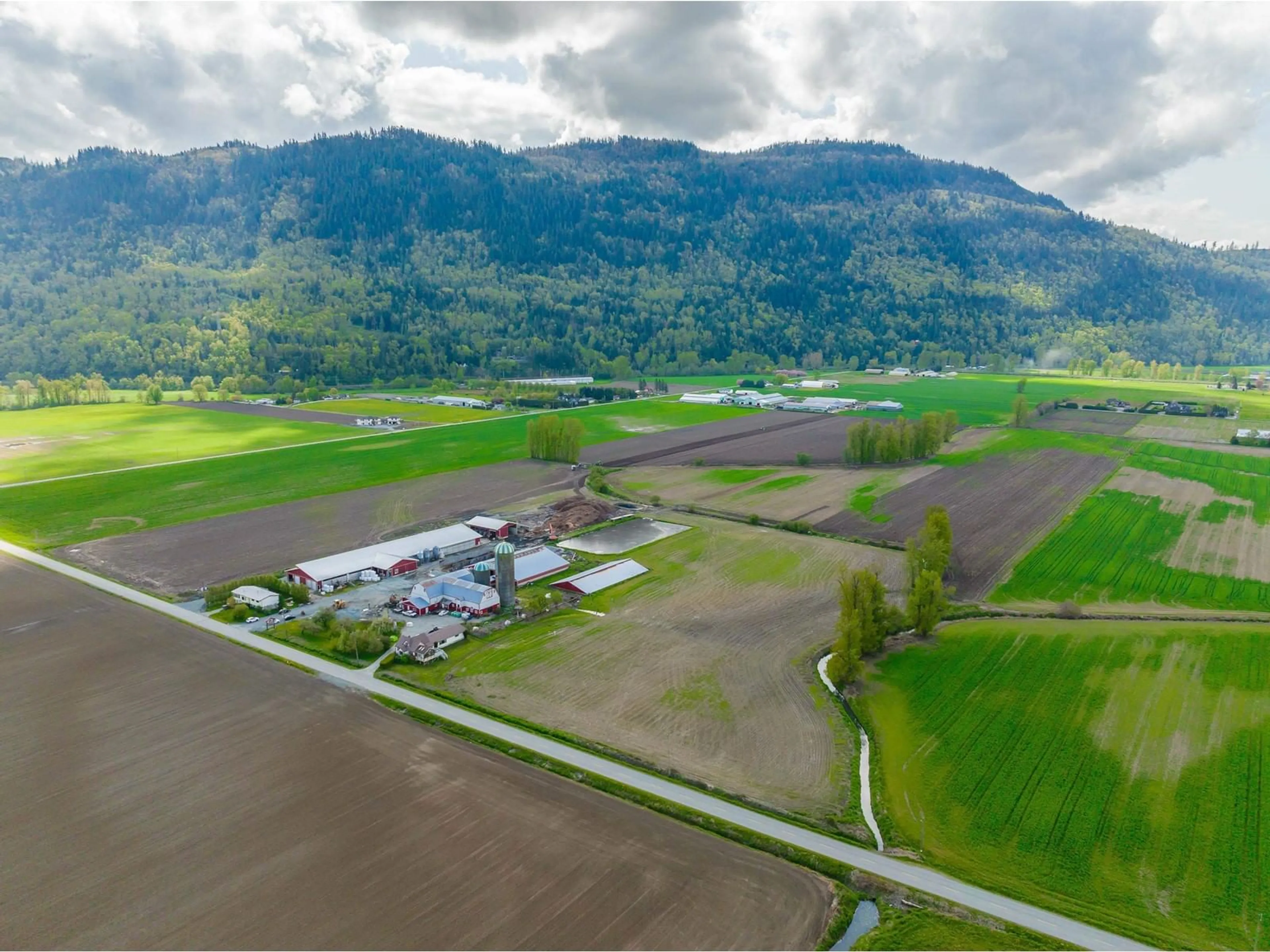 A pic from outside/outdoor area/front of a property/back of a property/a pic from drone, mountain view for 39464 WELLS LINE, Abbotsford British Columbia V3G2A3