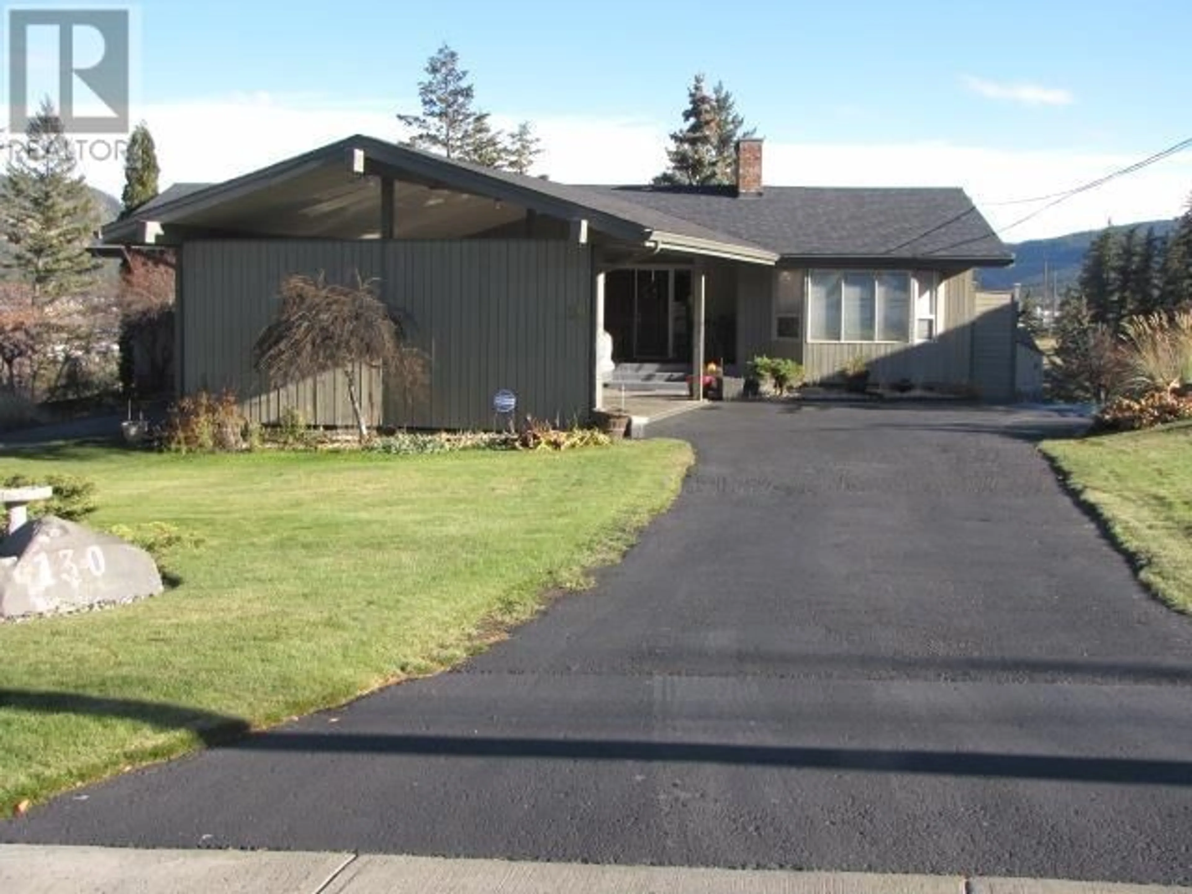 Frontside or backside of a home for 130 COUNTRY CLUB BOULEVARD, Williams Lake British Columbia V2G3T2