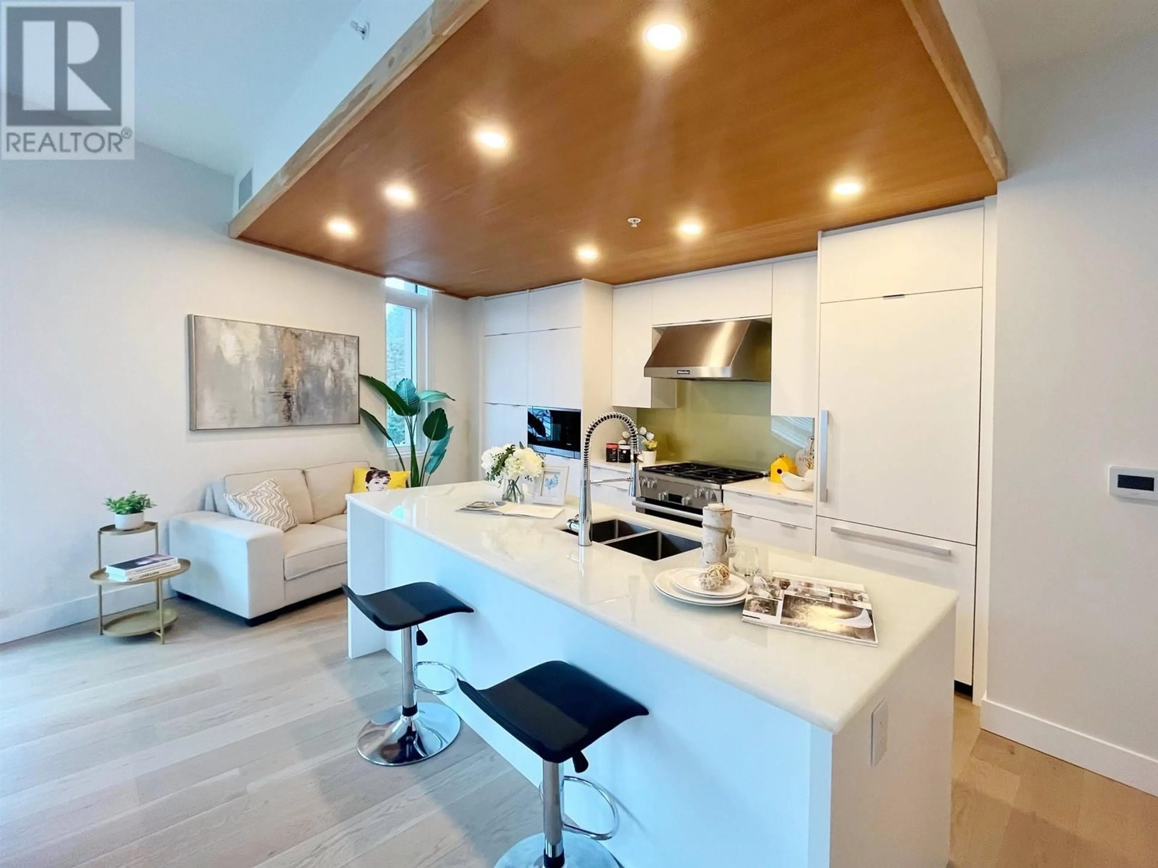 Contemporary kitchen, ceramic/tile floor for 409 - 6687 NELSON AVENUE, West Vancouver British Columbia V7W2B2