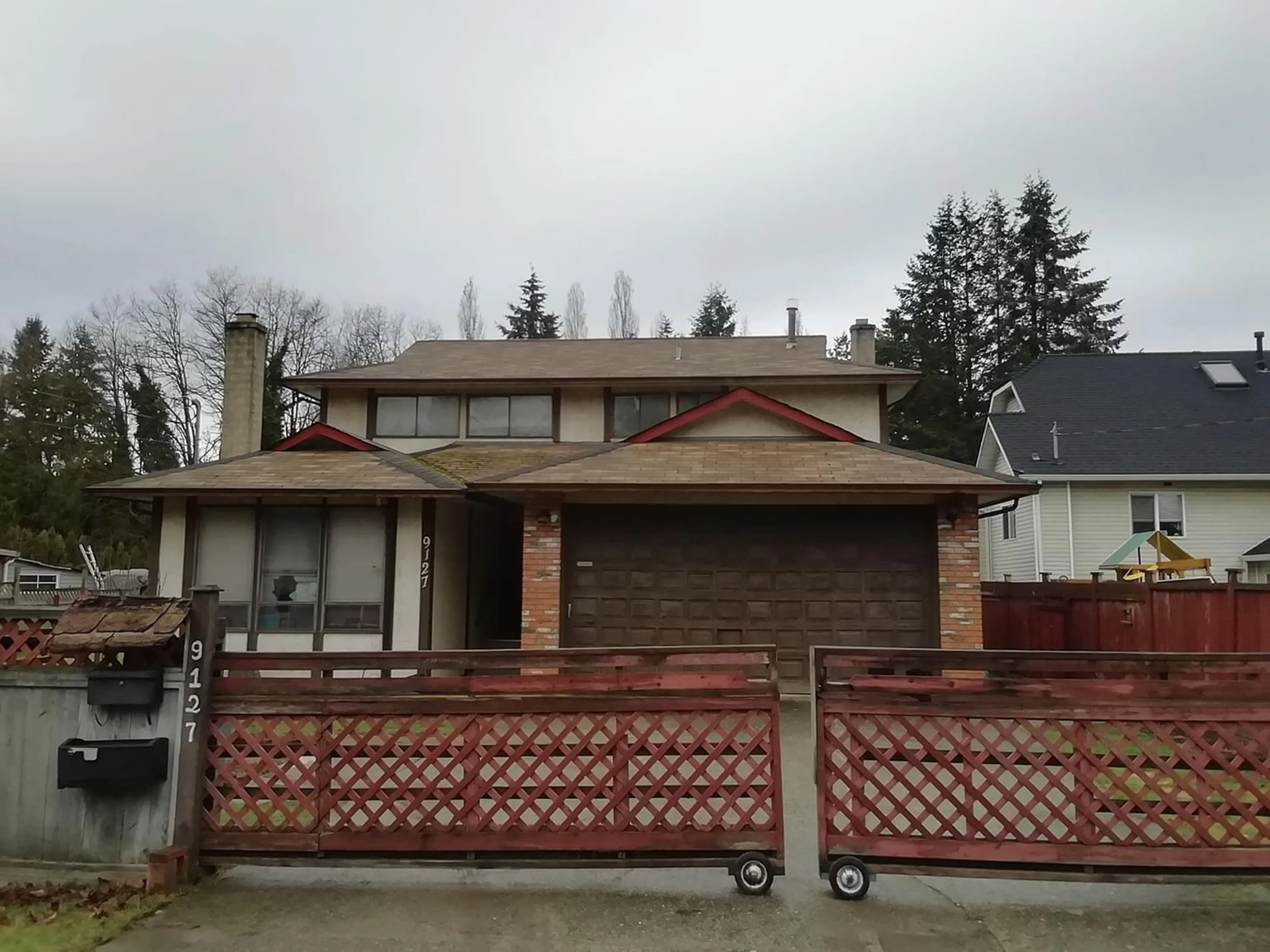 Frontside or backside of a home for 9127 149 STREET, Surrey British Columbia V3R3Z5