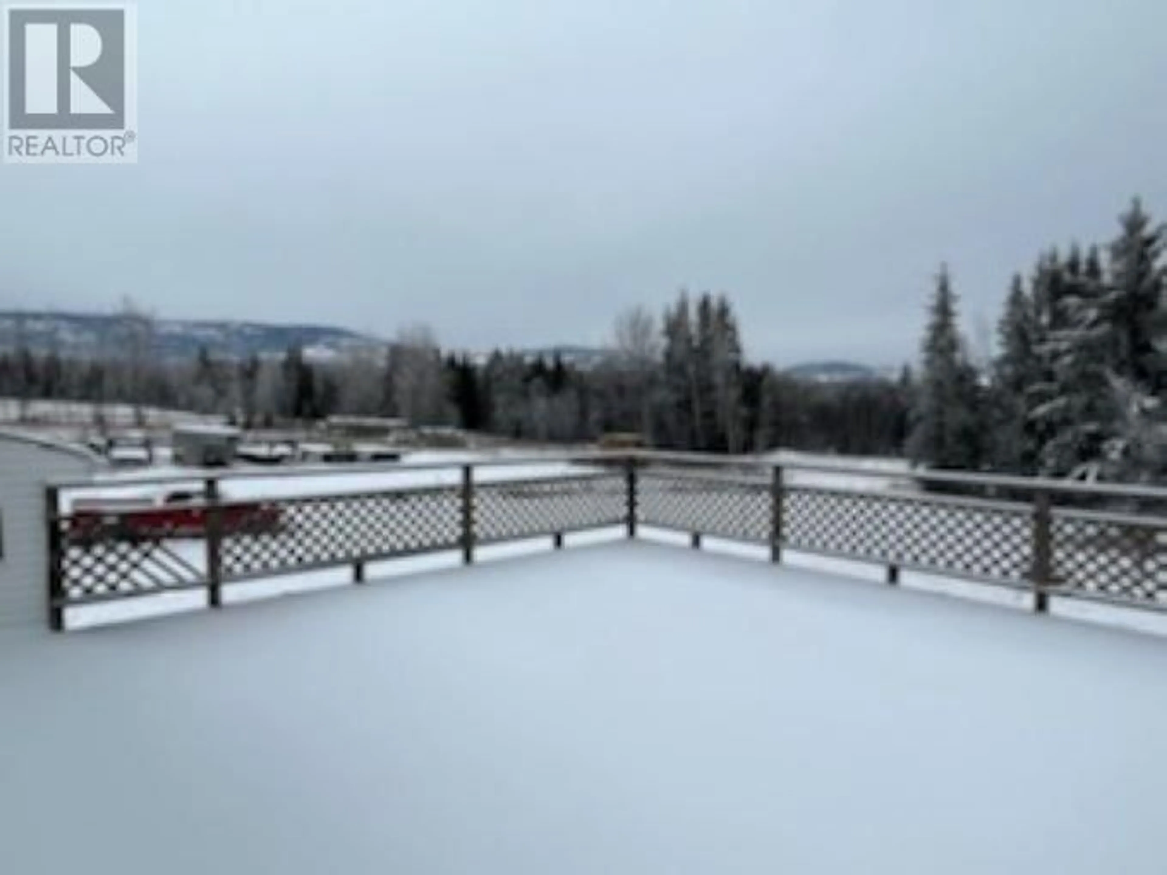 Patio, the fenced backyard for 21233 SHORT ROAD, Burns Lake British Columbia V0J1E2