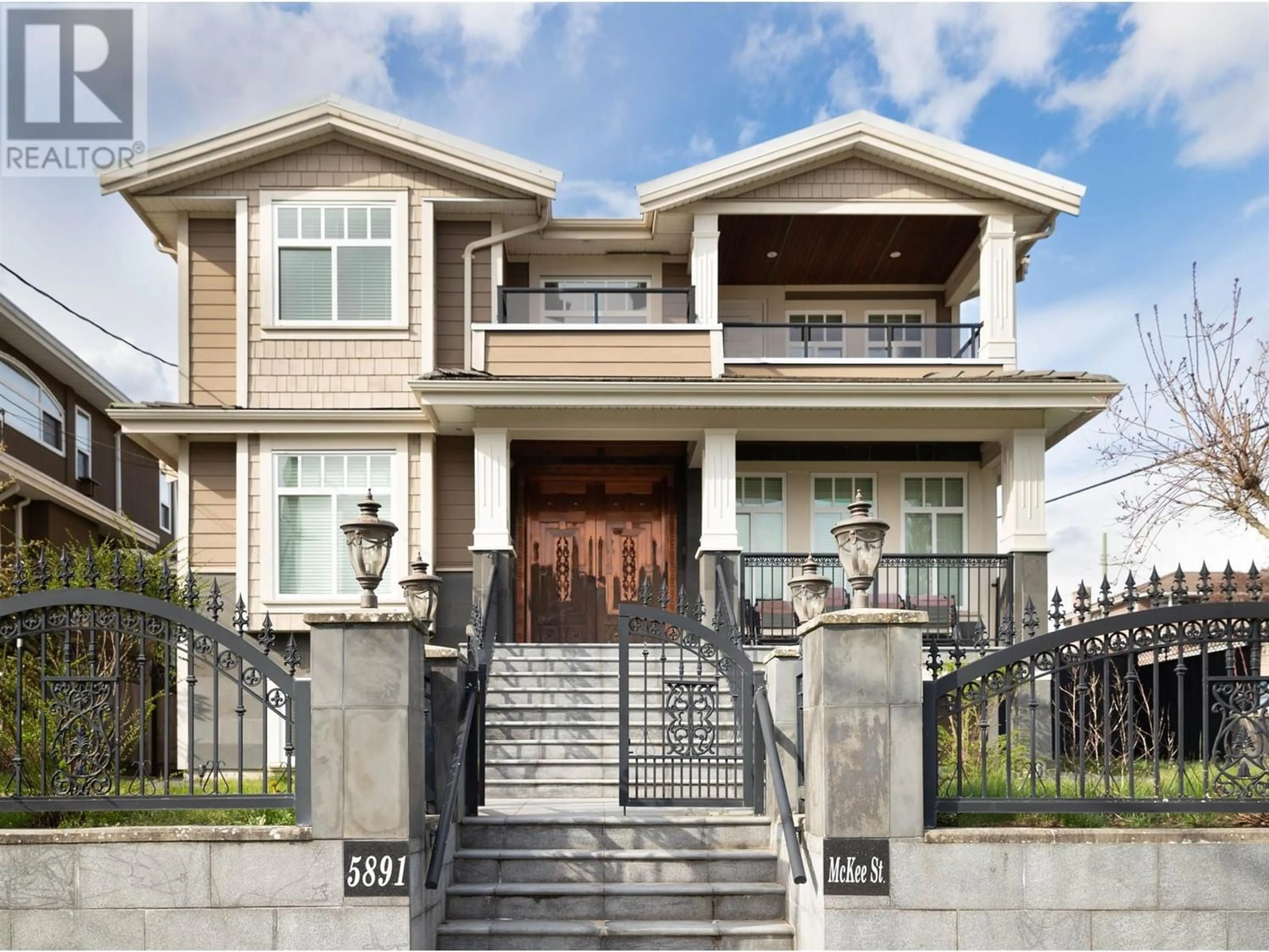 Frontside or backside of a home for 5891 MCKEE STREET, Burnaby British Columbia V5J2V4