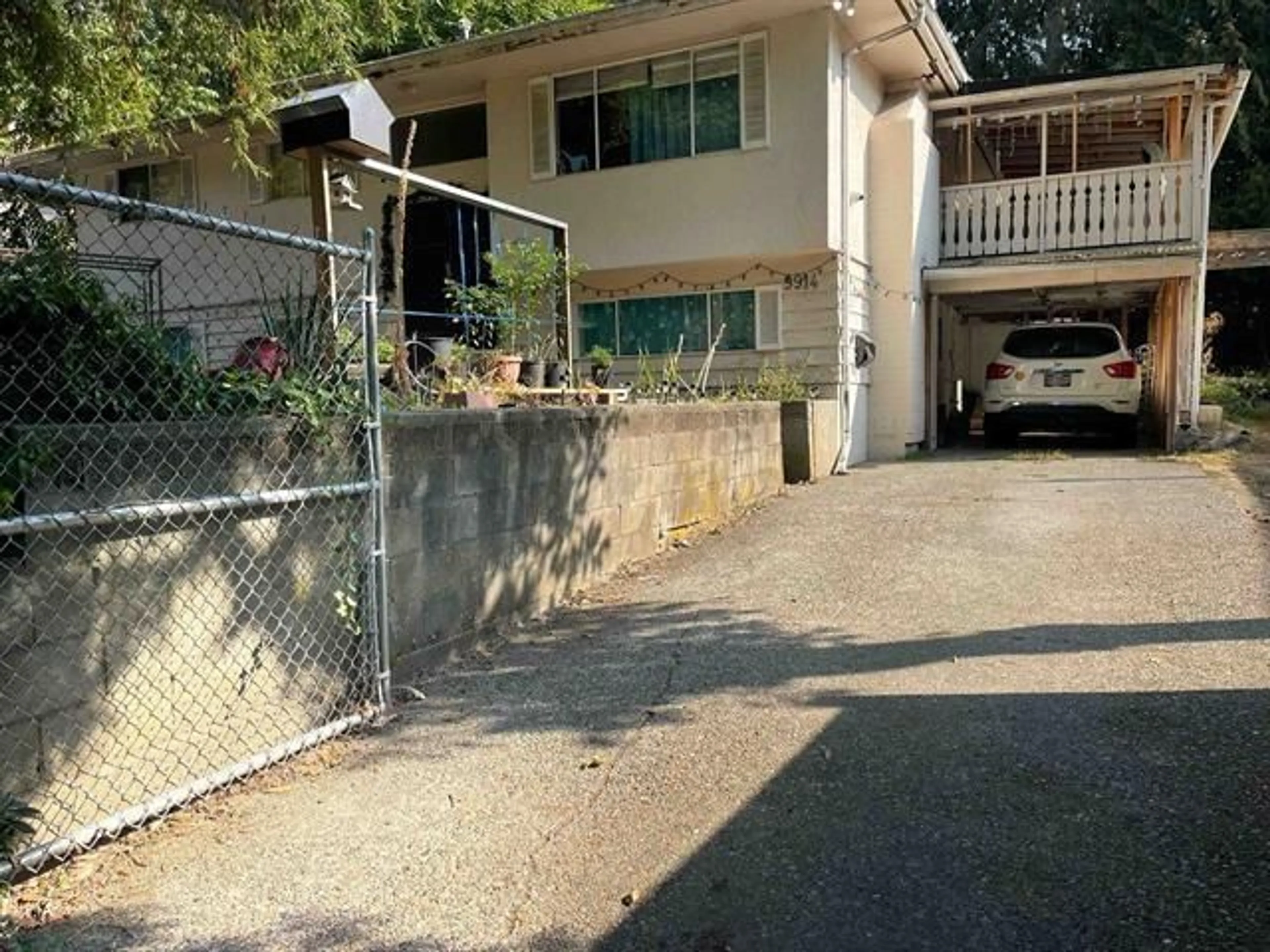 Frontside or backside of a home for 9914 138A STREET, Surrey British Columbia V3T4L1
