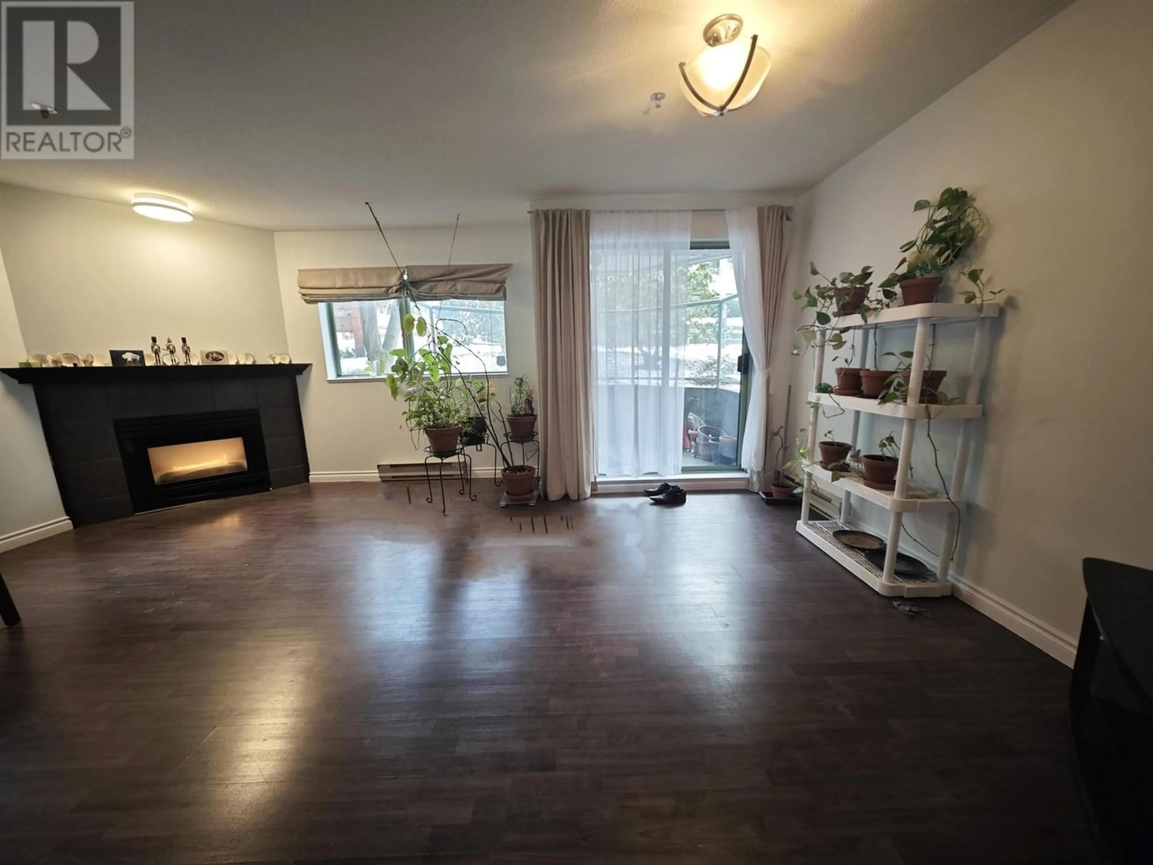 A pic of a room, wood floors for 210 6737 STATION HILL COURT, Burnaby British Columbia V3N4V2