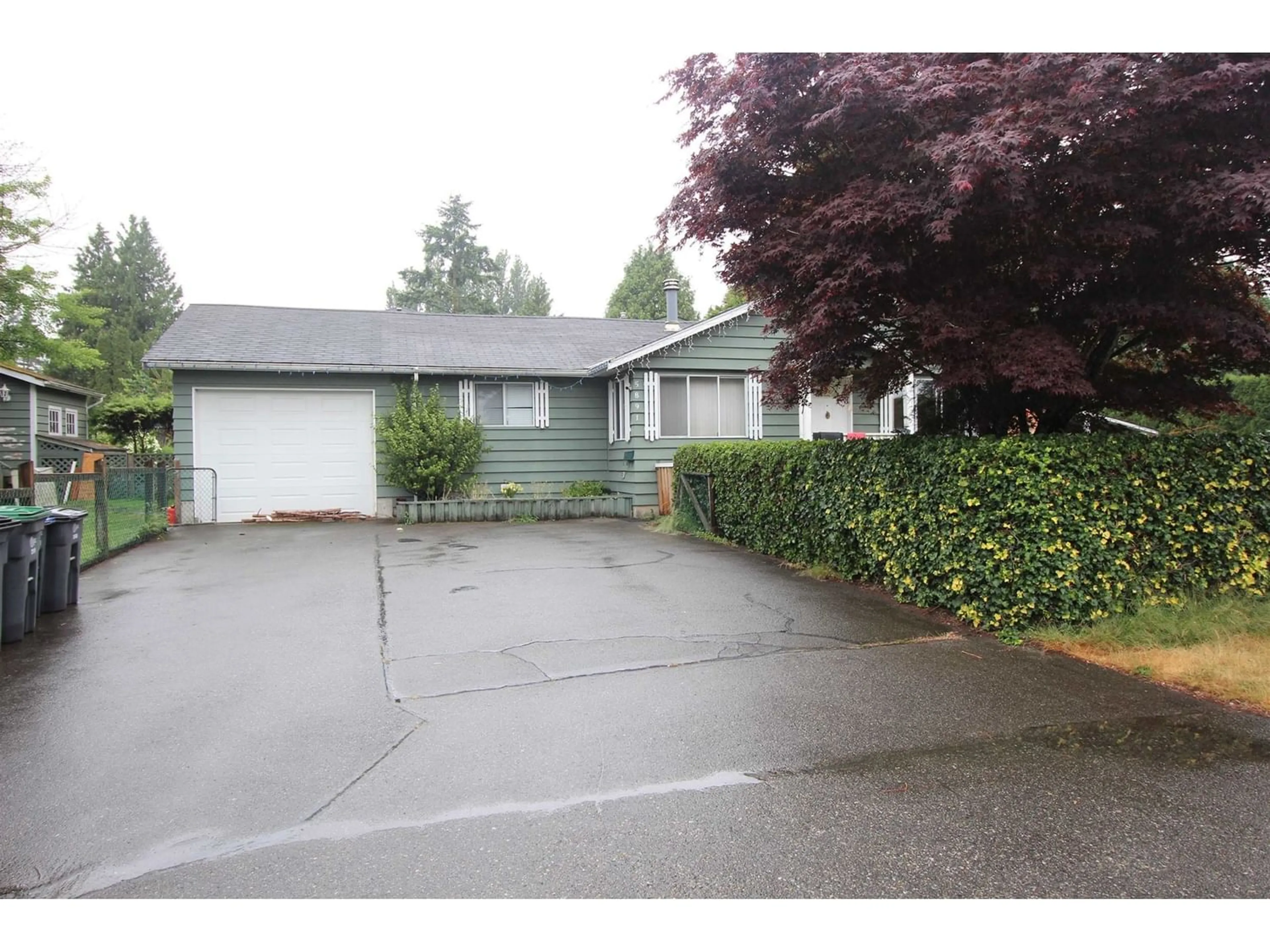 Frontside or backside of a home for 5891 173B STREET, Surrey British Columbia V3S4A9