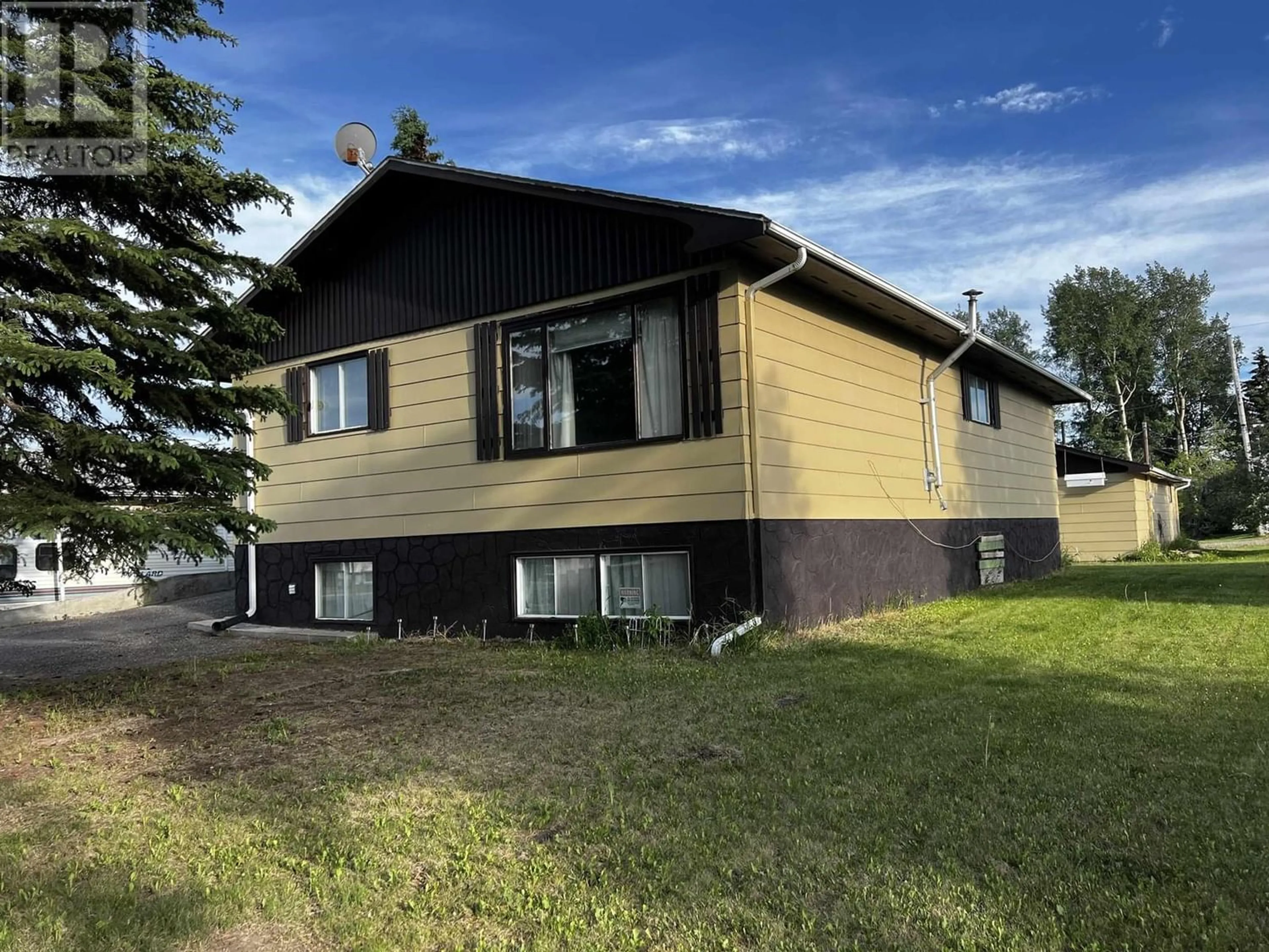 Frontside or backside of a home for 8407 97 AVENUE, Fort St. John British Columbia V1J1M3