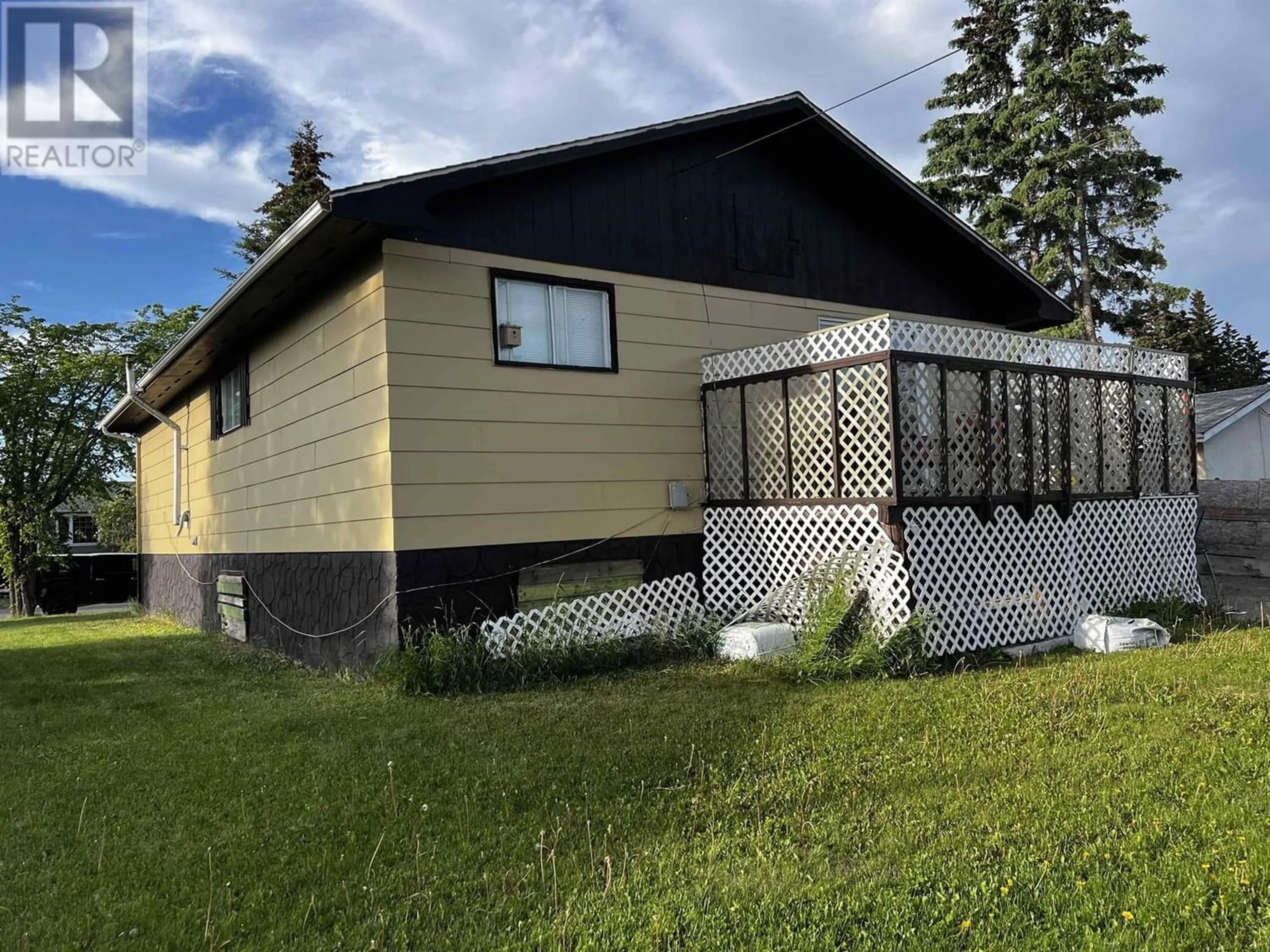 Frontside or backside of a home for 8407 97 AVENUE, Fort St. John British Columbia V1J1M3