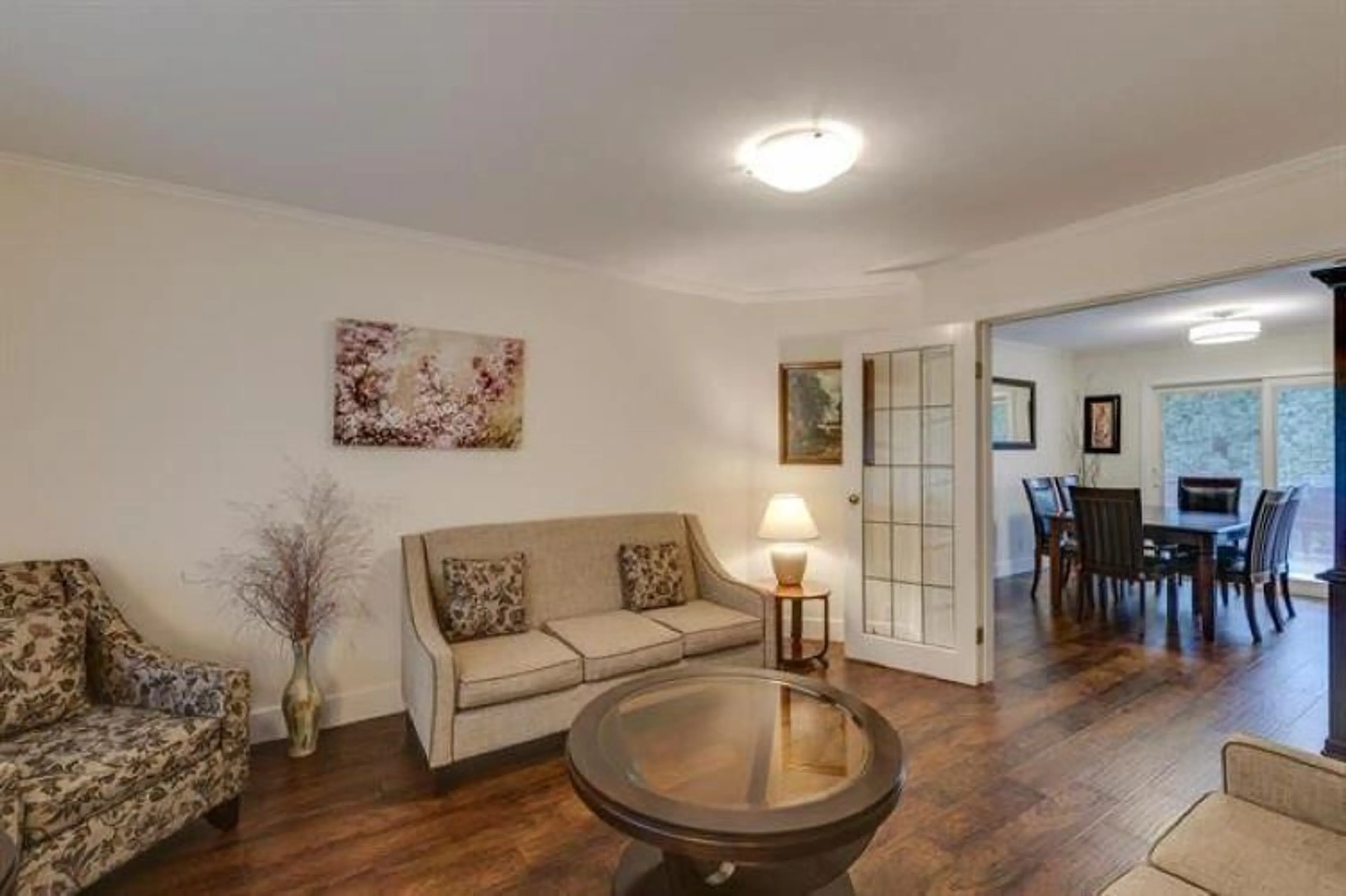Living room with furniture, wood/laminate floor for 32964 10, Mission British Columbia V2V2K3