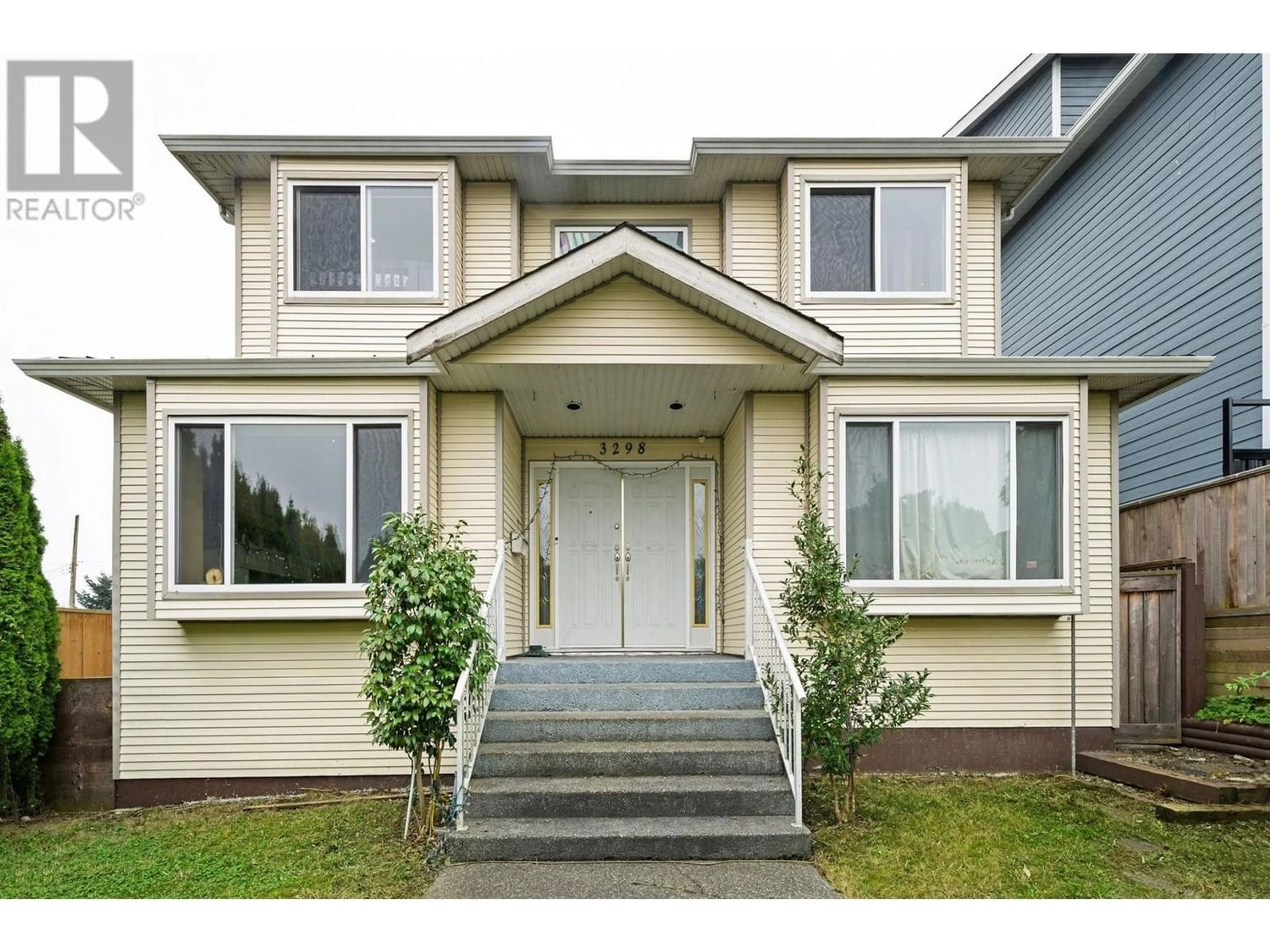 Frontside or backside of a home for 3298 E 2ND AVENUE, Vancouver British Columbia V5M1G3
