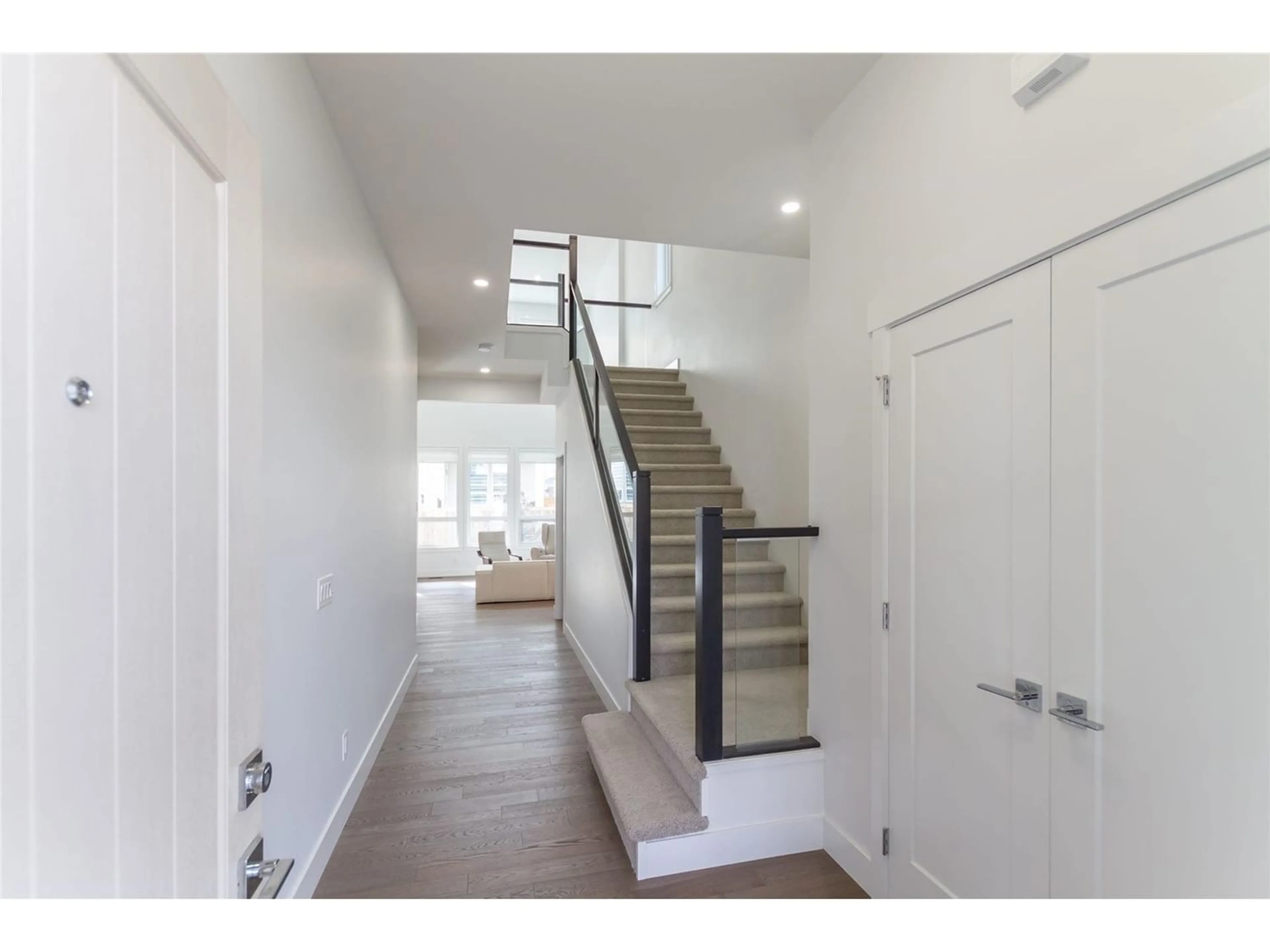 Indoor entryway, wood floors for 20496 77B AVENUE, Langley British Columbia V2Y4K3