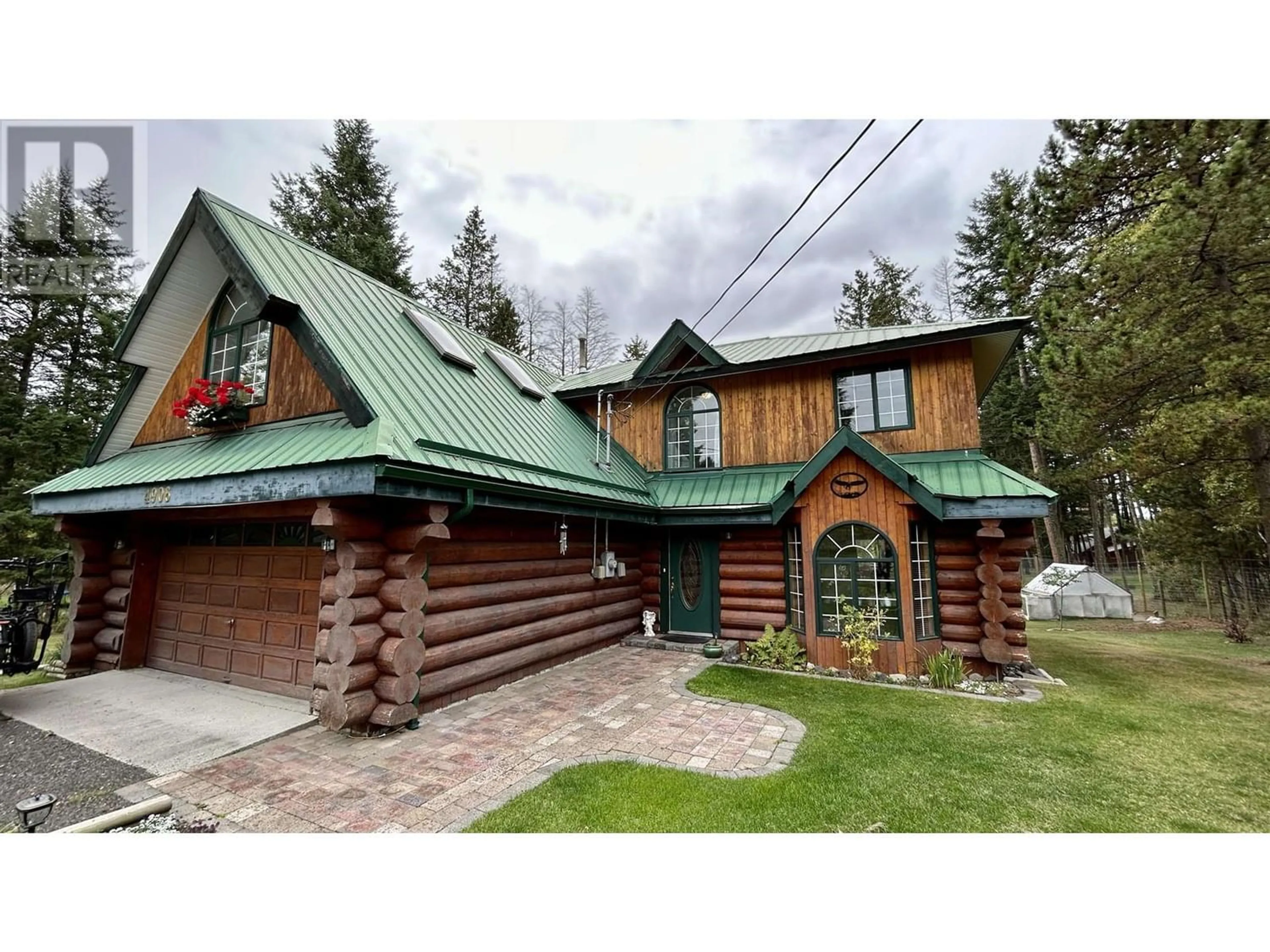 Frontside or backside of a home for 4906 KITWANGA DRIVE, 108 Mile Ranch British Columbia V0K2Z0