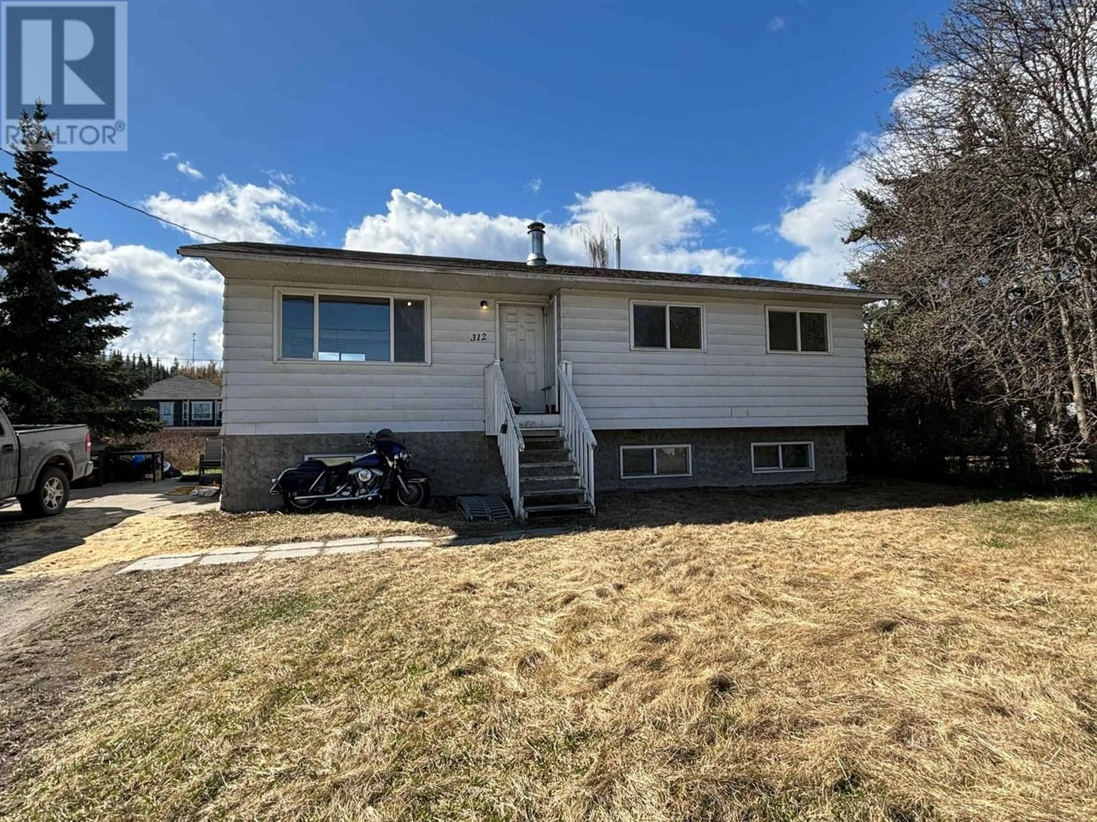 Frontside or backside of a home, the front or back of building for 312 W 2ND STREET, Vanderhoof British Columbia V0J3A0