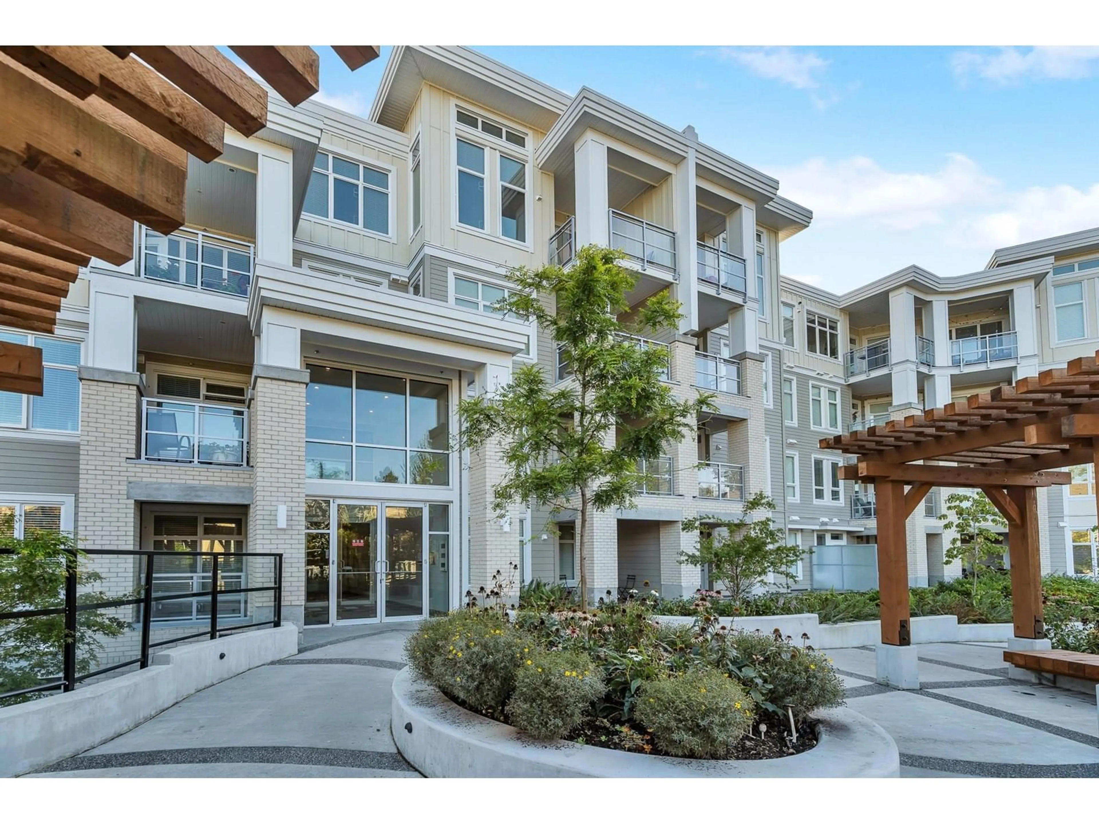 A pic from exterior of the house or condo for 409 15436 31 AVENUE, Surrey British Columbia V3Z1H3