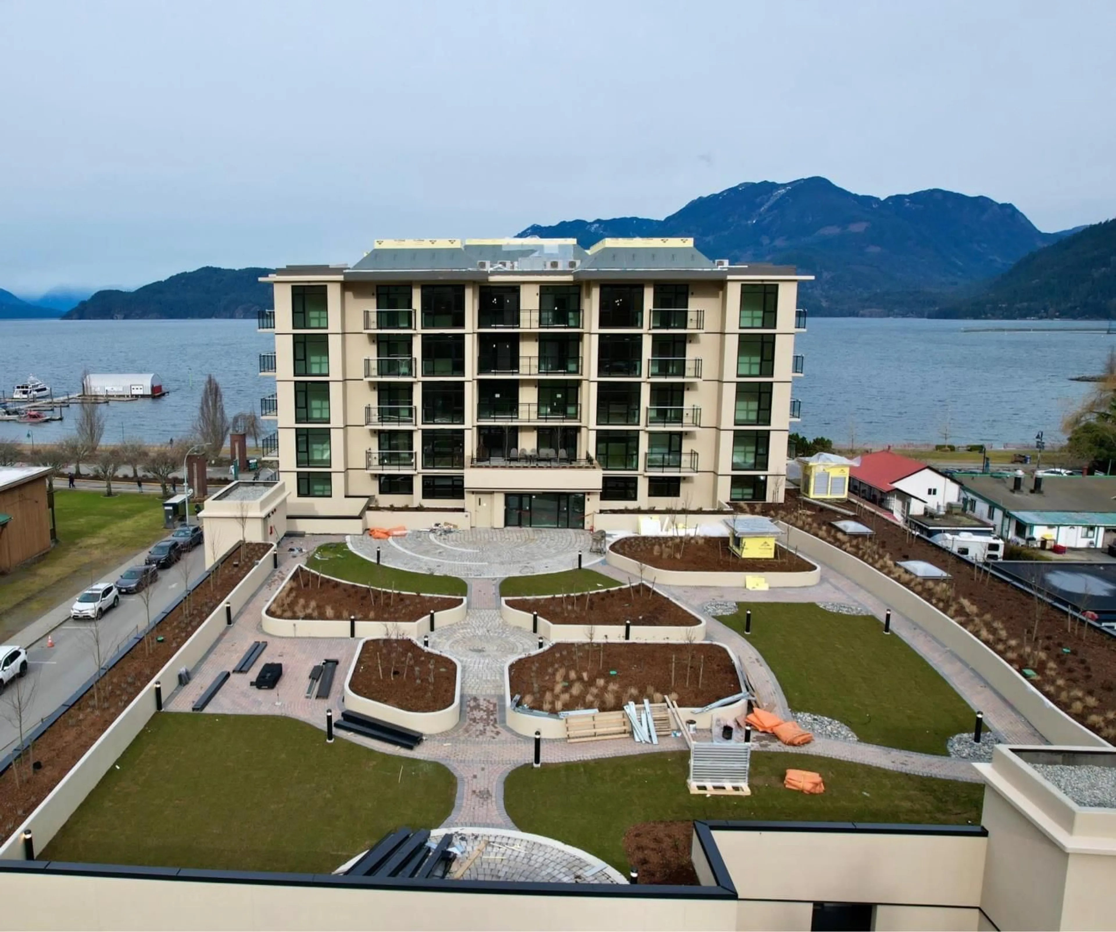 A pic from exterior of the house or condo, lake for 201 120 ESPLANADE AVENUE, Harrison Hot Springs British Columbia V0M1K0