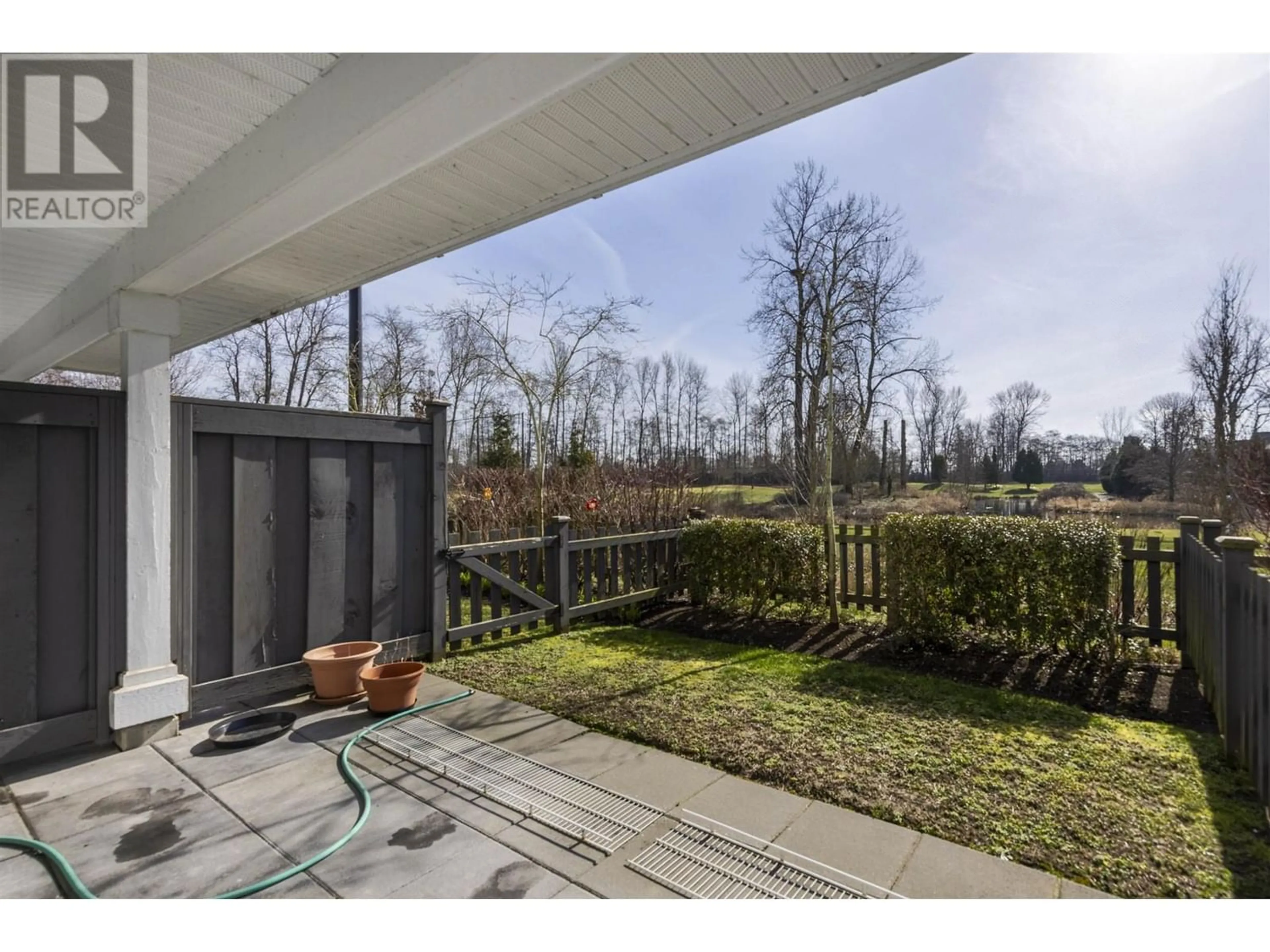 Patio, the fenced backyard for 60 5550 ADMIRAL WAY, Delta British Columbia V4K0C4