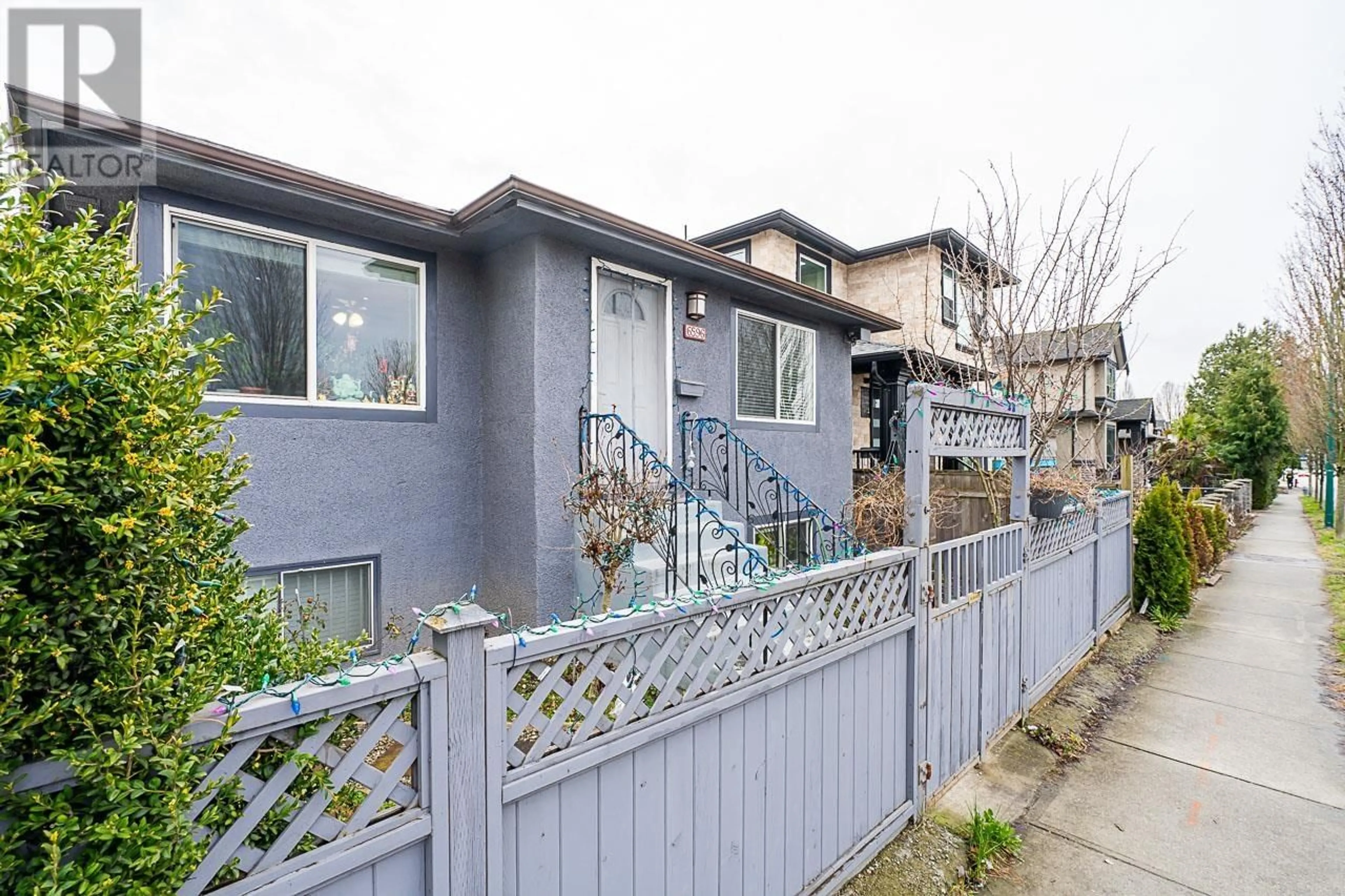 Frontside or backside of a home for 6596 KNIGHT STREET, Vancouver British Columbia V5P2W2