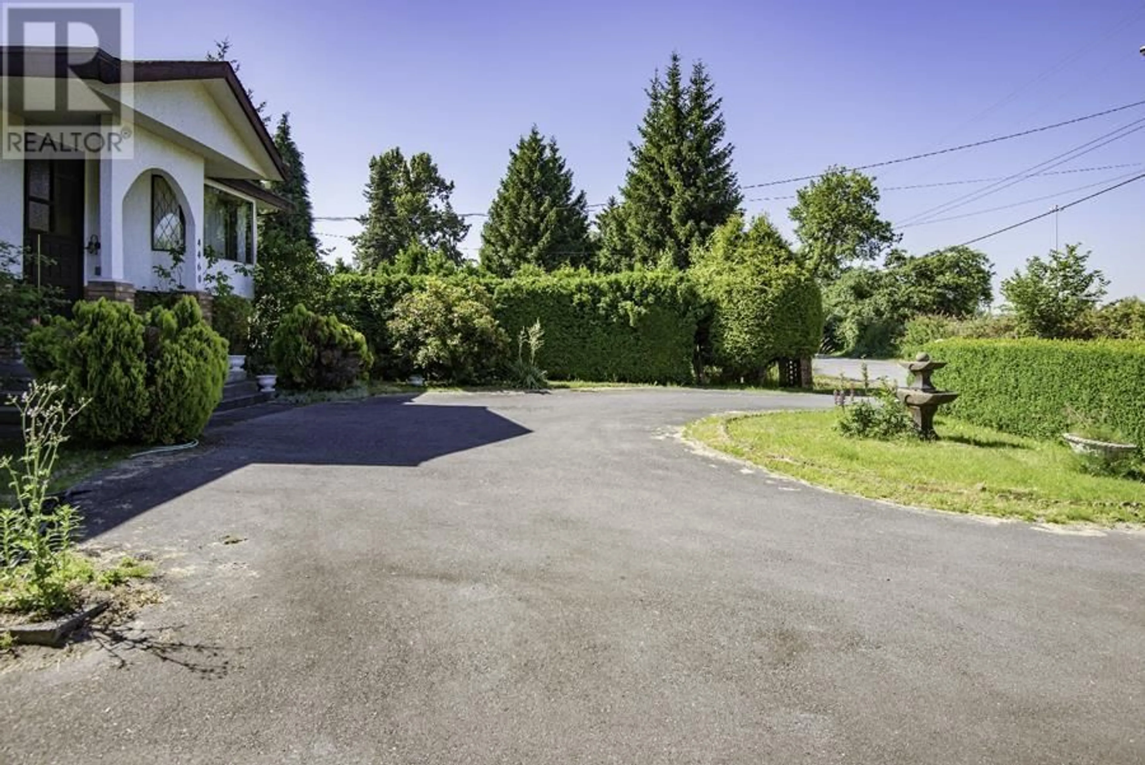 Frontside or backside of a home, the street view for 4460 THOMPSON ROAD, Richmond British Columbia V6V1S8